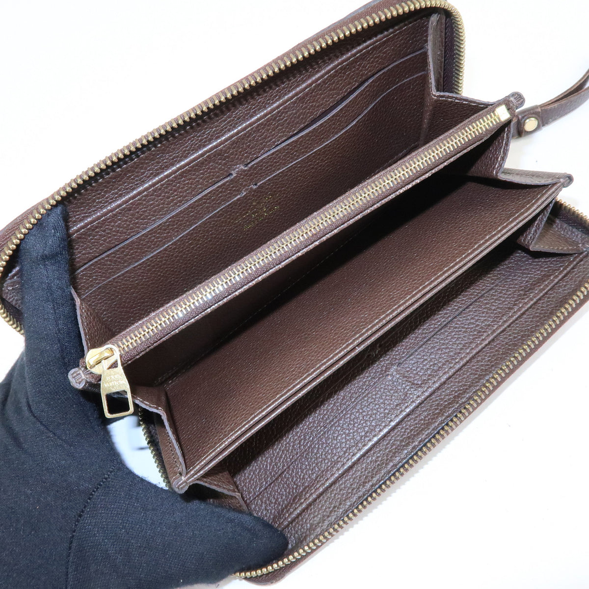 Louis Vuitton Monogram Empreinte Round Zippy Wallet Terre M60548