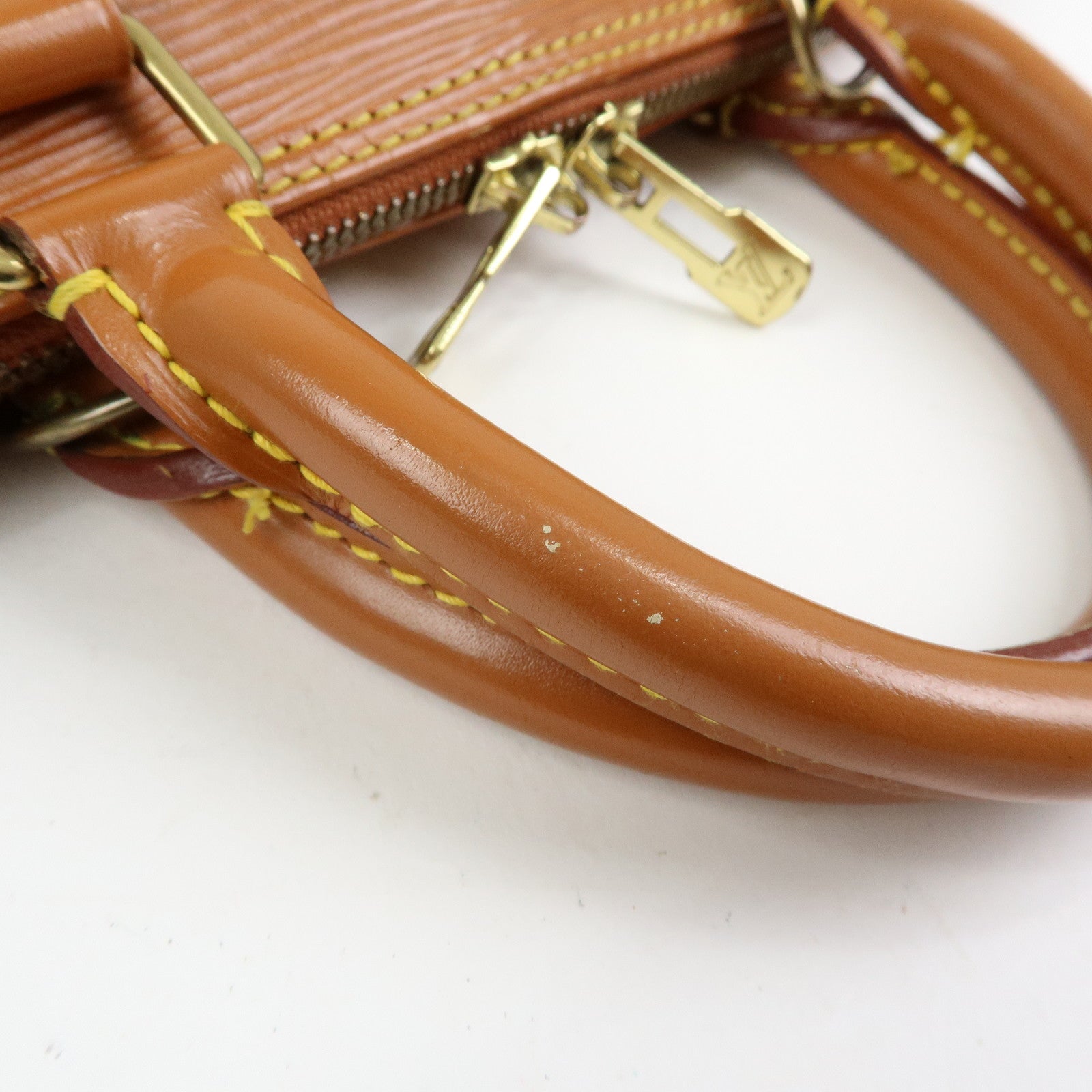 Louis Vuitton Epi Alma PM Leather Hand Bag Zipang Gold M52148