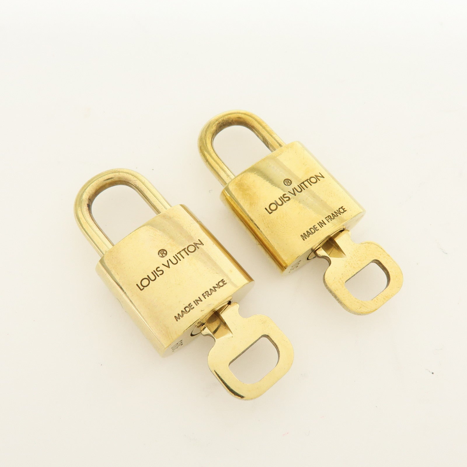 Louis Vuitton Lot of 10 Metal Lock & Key Cadena Key Lock Gold