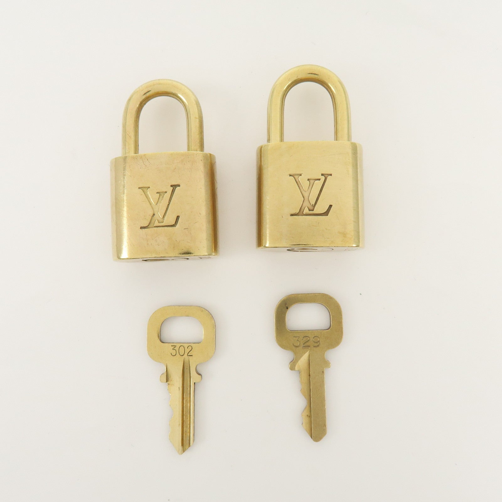 Louis Vuitton Set of 10 Metal Lock & Key Cadena Key Lock Gold