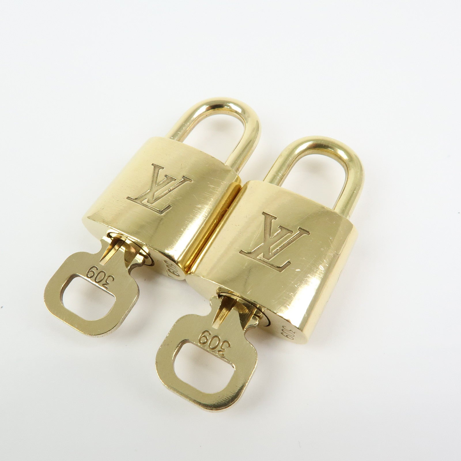 Louis Vuitton Set of 10 Lock & Key Cadena Key Lock Gold