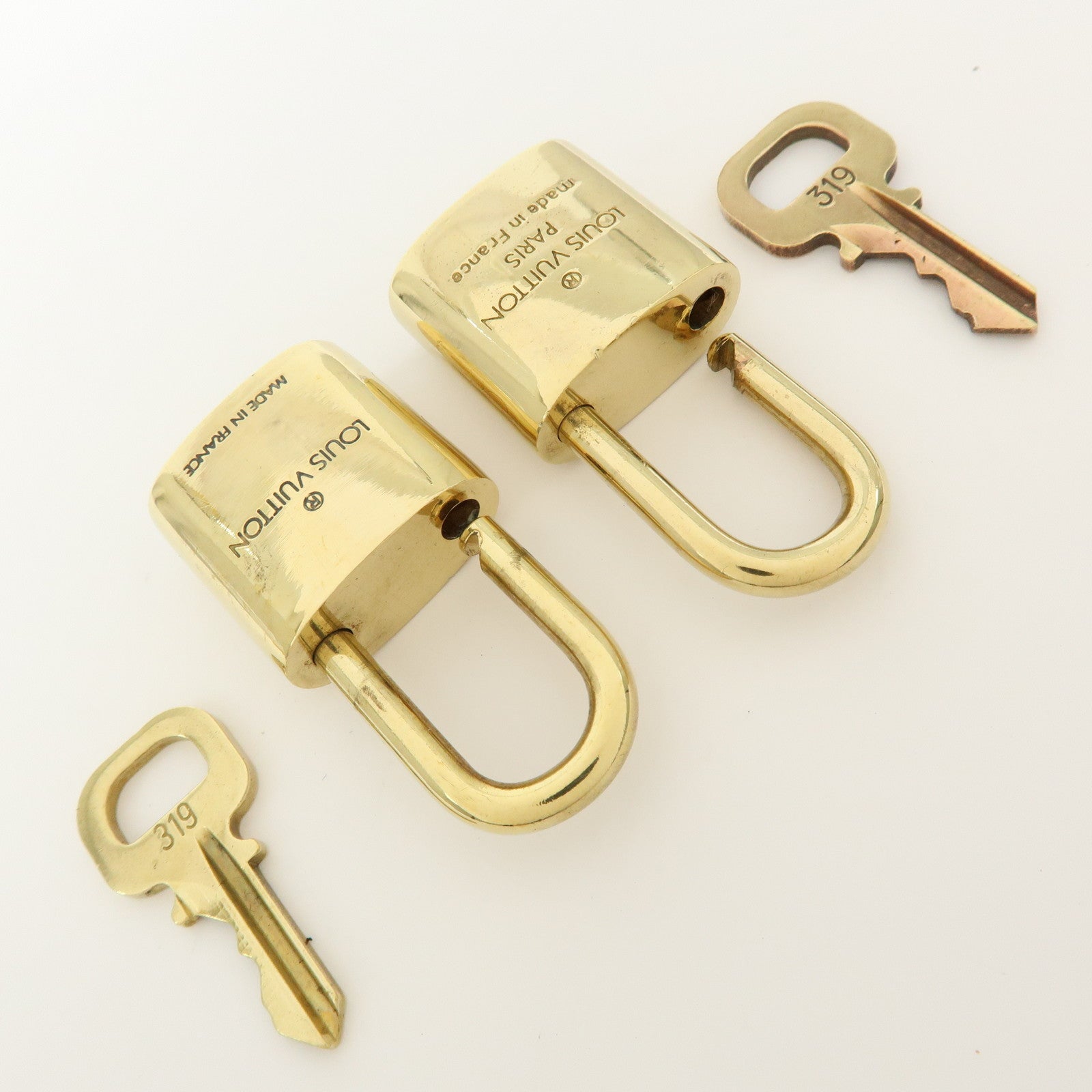 Louis Vuitton Set of 10 Lock & Key Cadena Key Lock Gold
