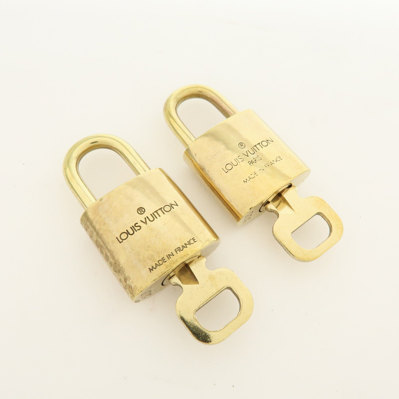 Louis Vuitton Lot of 10 Metal Lock & Key Cadena Key Lock Gold