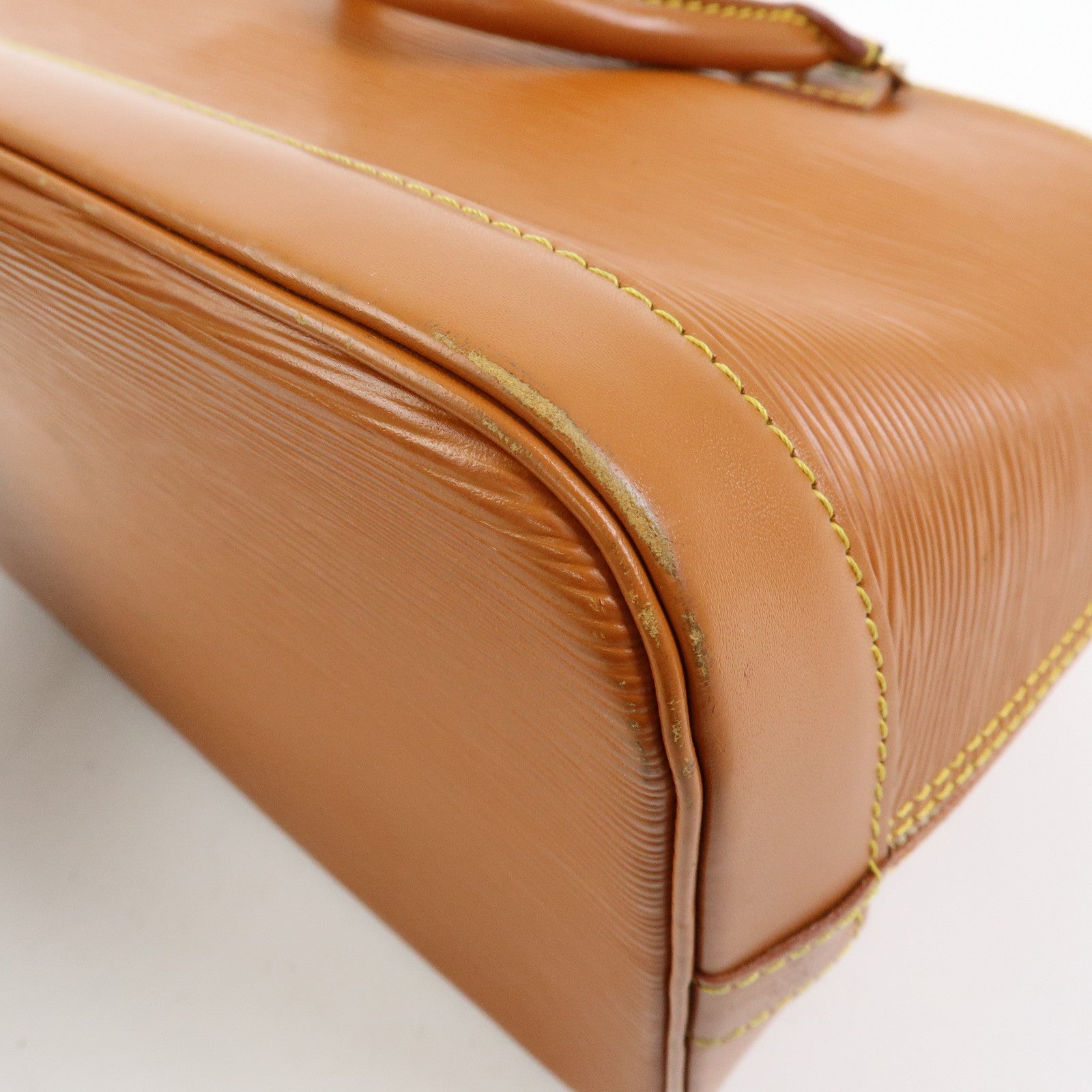 Louis Vuitton Epi Alma PM Leather Hand Bag Zipang Gold M52148