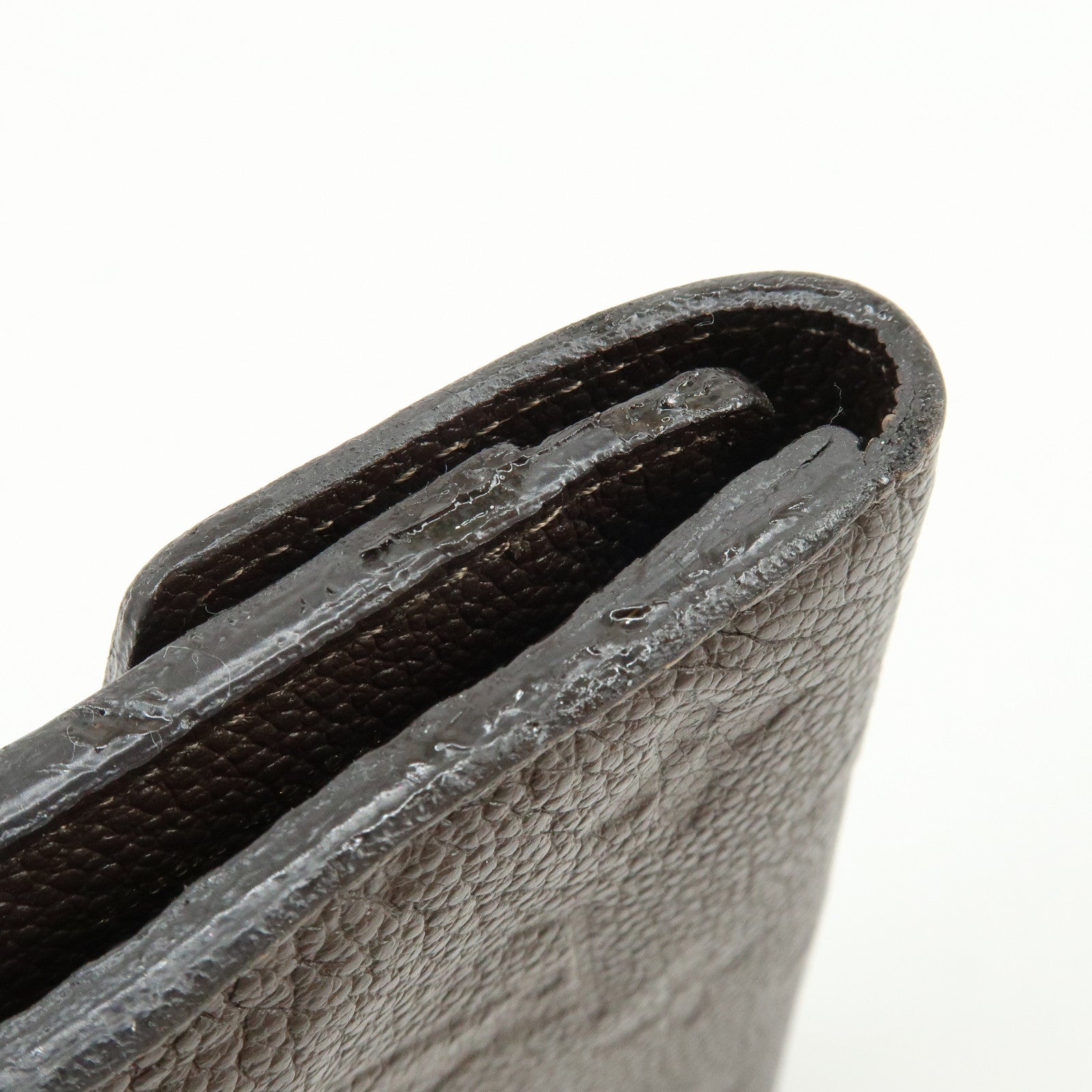 Louis Vuitton Empreinte Portefeuille Curieuse Compact Wallet M60543