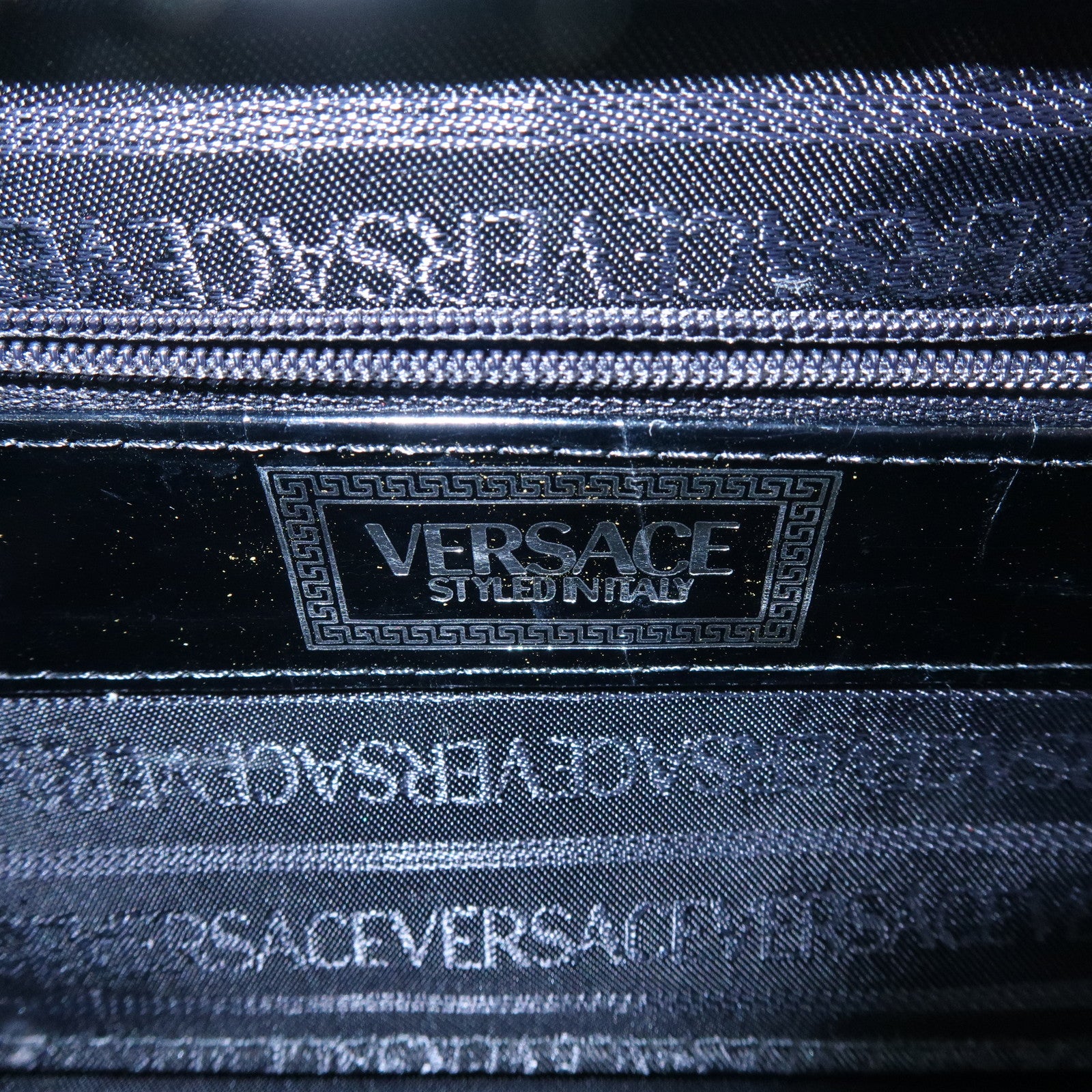 GIANNI VERSACE Embossed Leather Kiss Lock Top Handle Hand Bag Black
