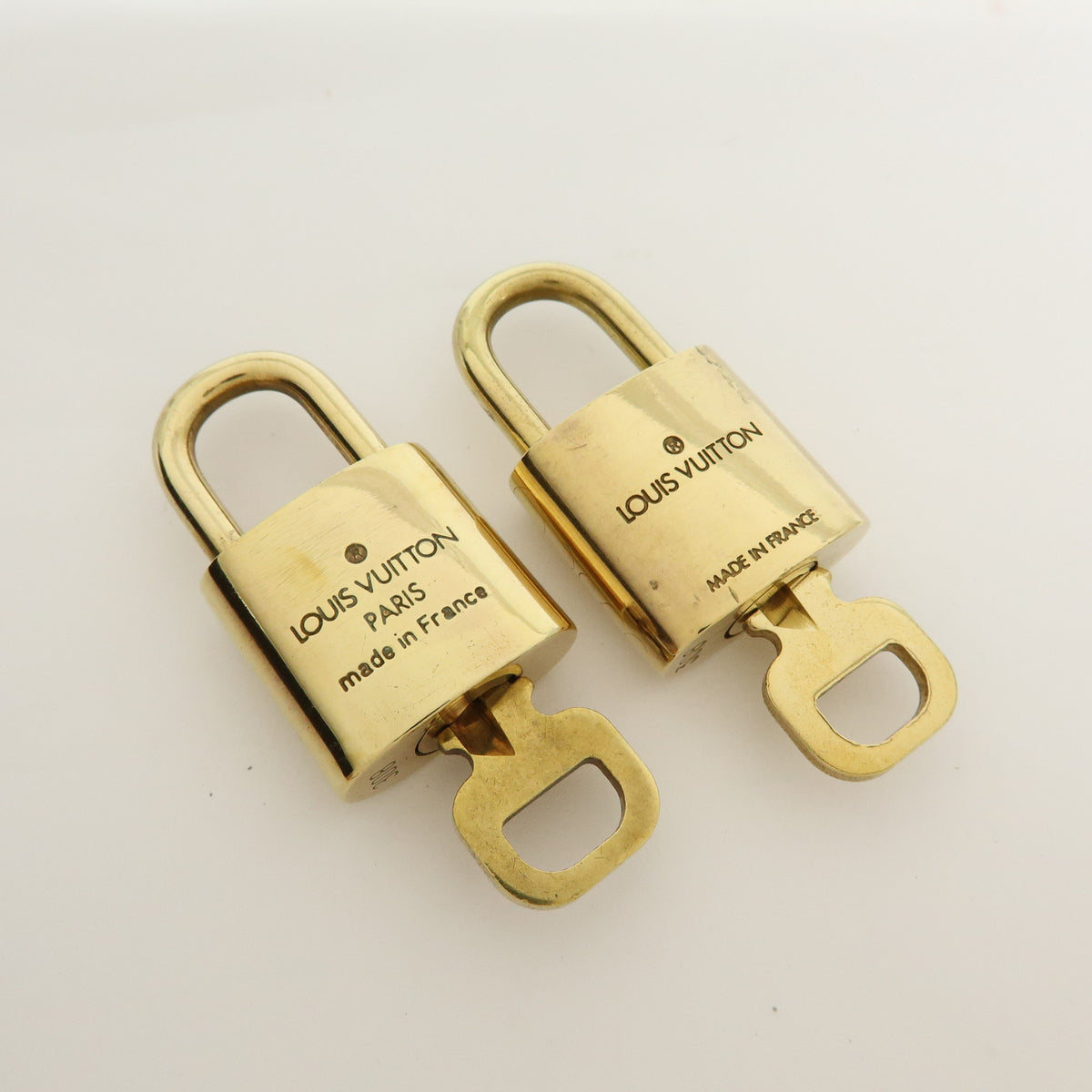 Louis Vuitton Lot of 10 Metal Lock & Key Cadena Key Lock Gold