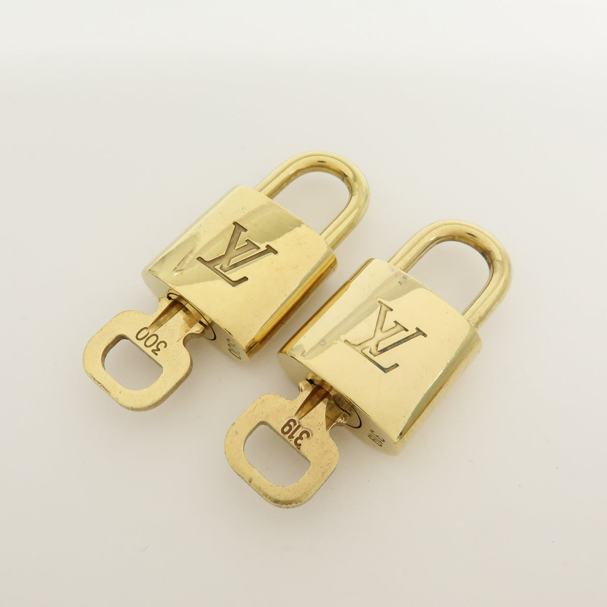 Louis Vuitton Lot of 10 Metal Lock & Key Cadena Key Lock Gold