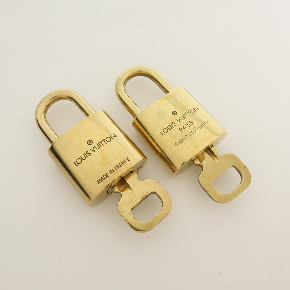 Louis Vuitton Lot of 10 Metal Lock & Key Cadena Key Lock Gold