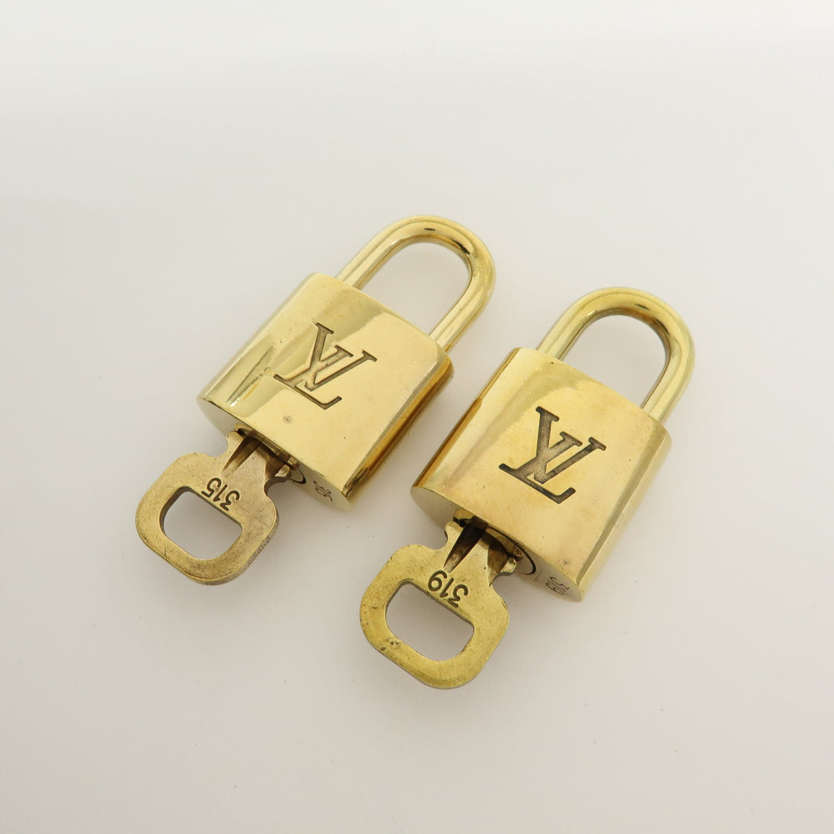 Louis Vuitton Lot of 10 Metal Lock & Key Cadena Key Lock Gold
