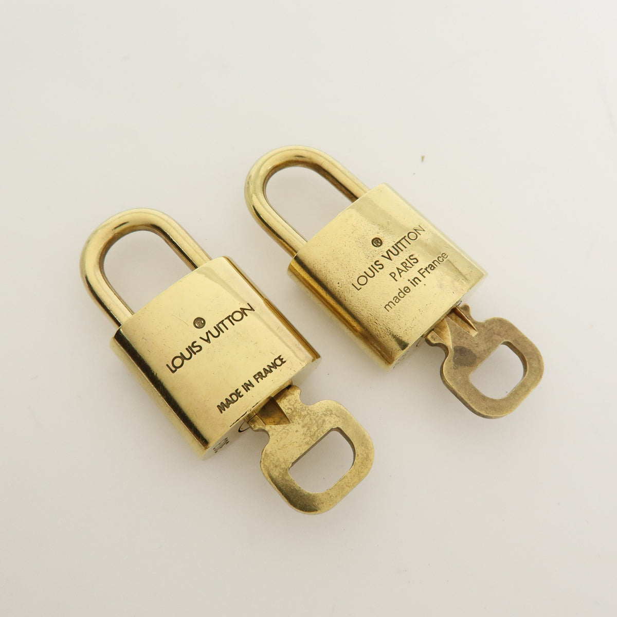 Louis Vuitton Lot of 10 Metal Lock & Key Cadena Key Lock Gold