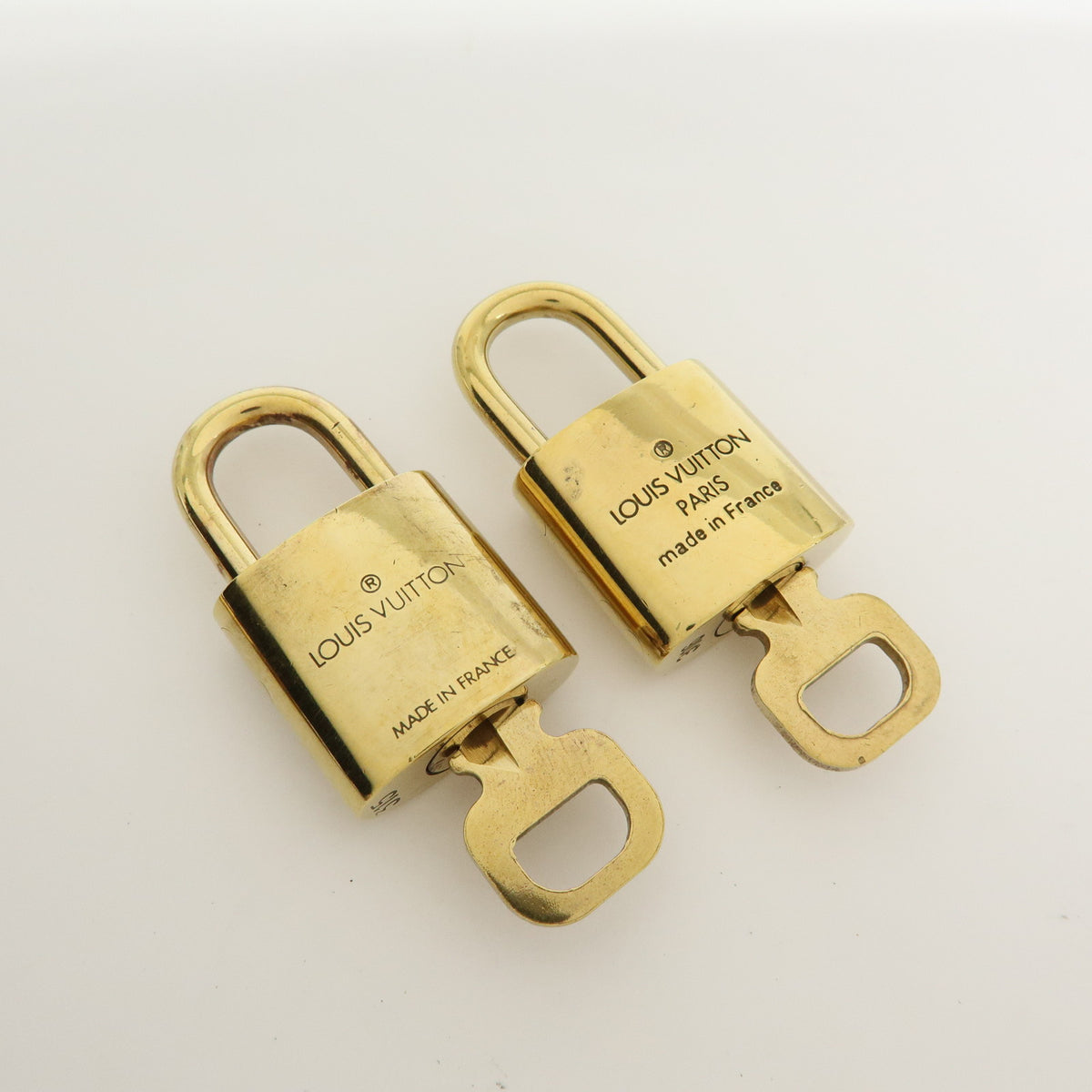 Louis Vuitton Lot of 10 Metal Lock & Key Cadena Key Lock Gold