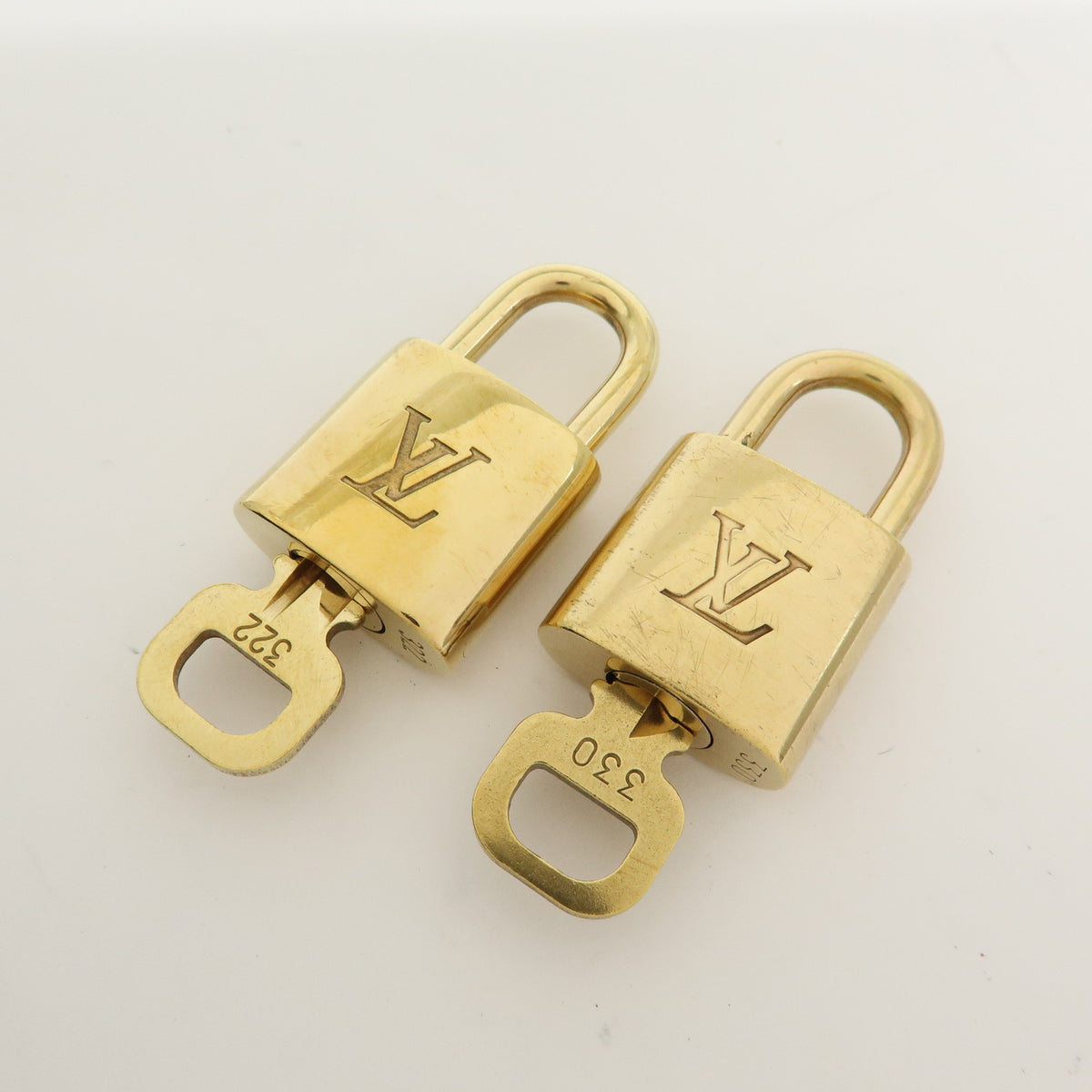 Louis Vuitton Lot of 10 Metal Lock & Key Cadena Key Lock Gold