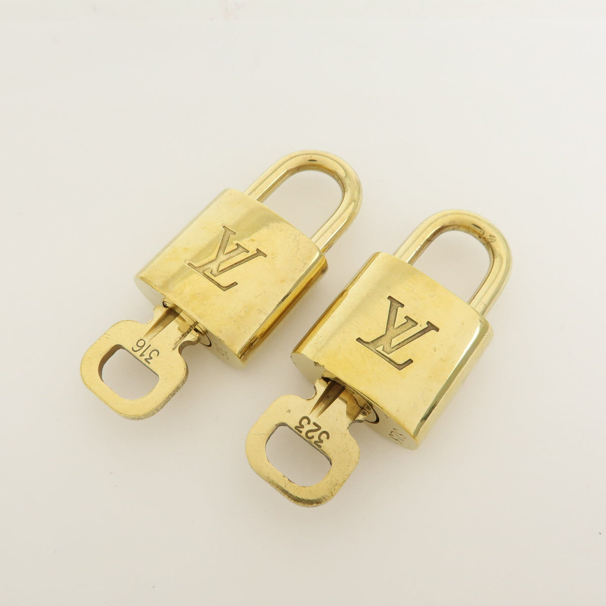 Louis Vuitton Lot of 10 Metal Lock & Key Cadena Key Lock Gold