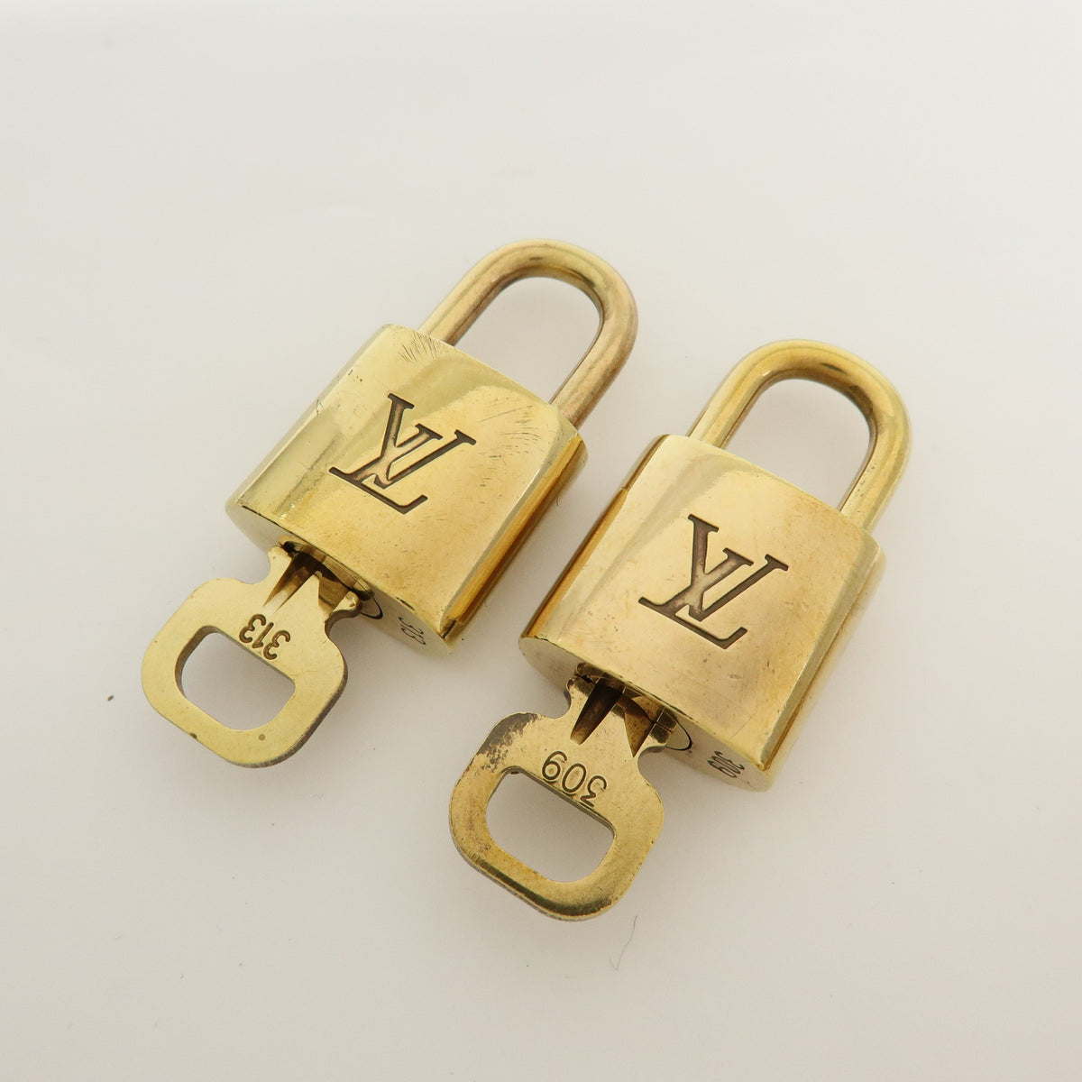 Louis Vuitton Lot of 10 Metal Lock & Key Cadena Key Lock Gold