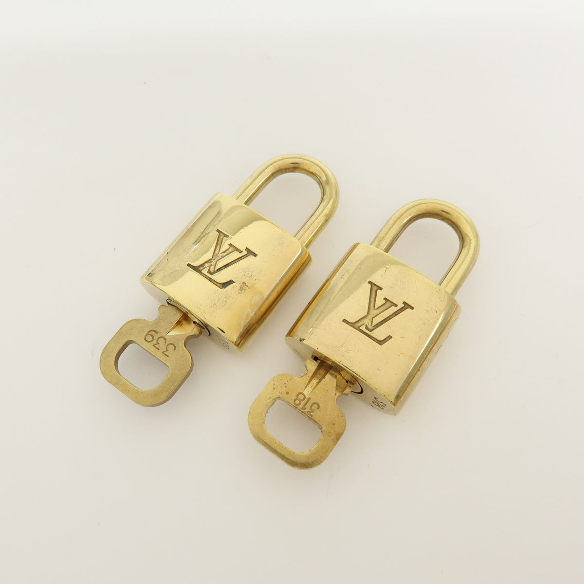 Louis Vuitton Lot of 10 Metal Lock & Key Cadena Key Lock Gold