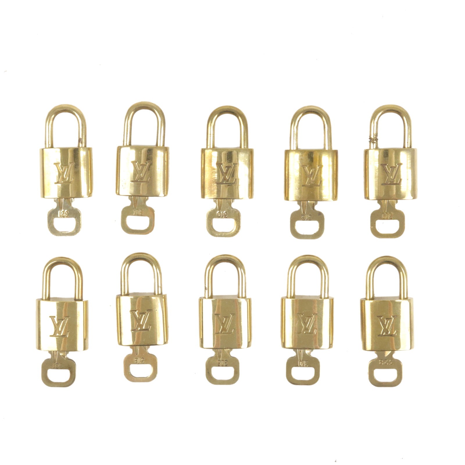 Authentic pre-owned Louis Vuitton lock & key set