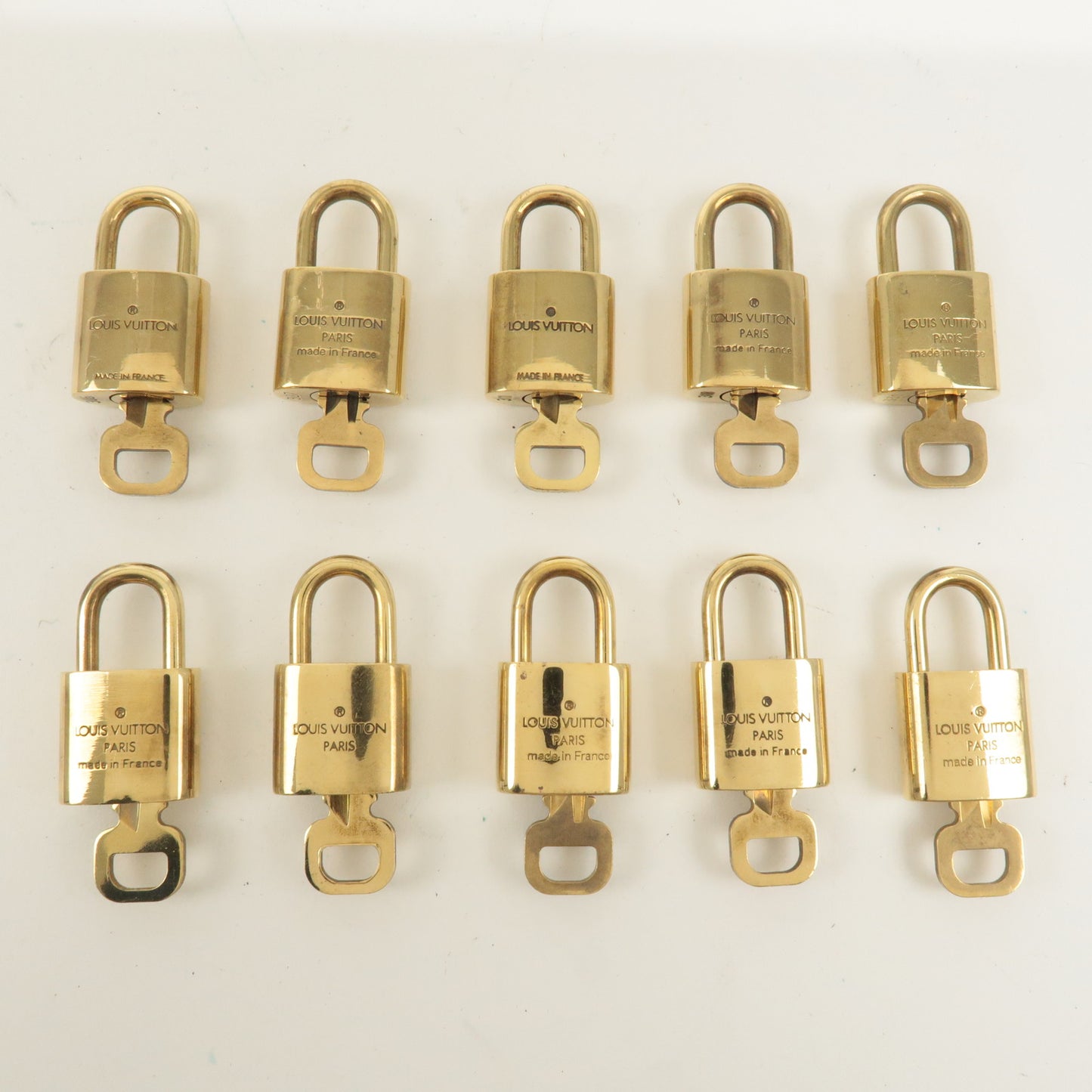 Louis Vuitton Set of 10 Lock & Key Cadena Key Lock Gold