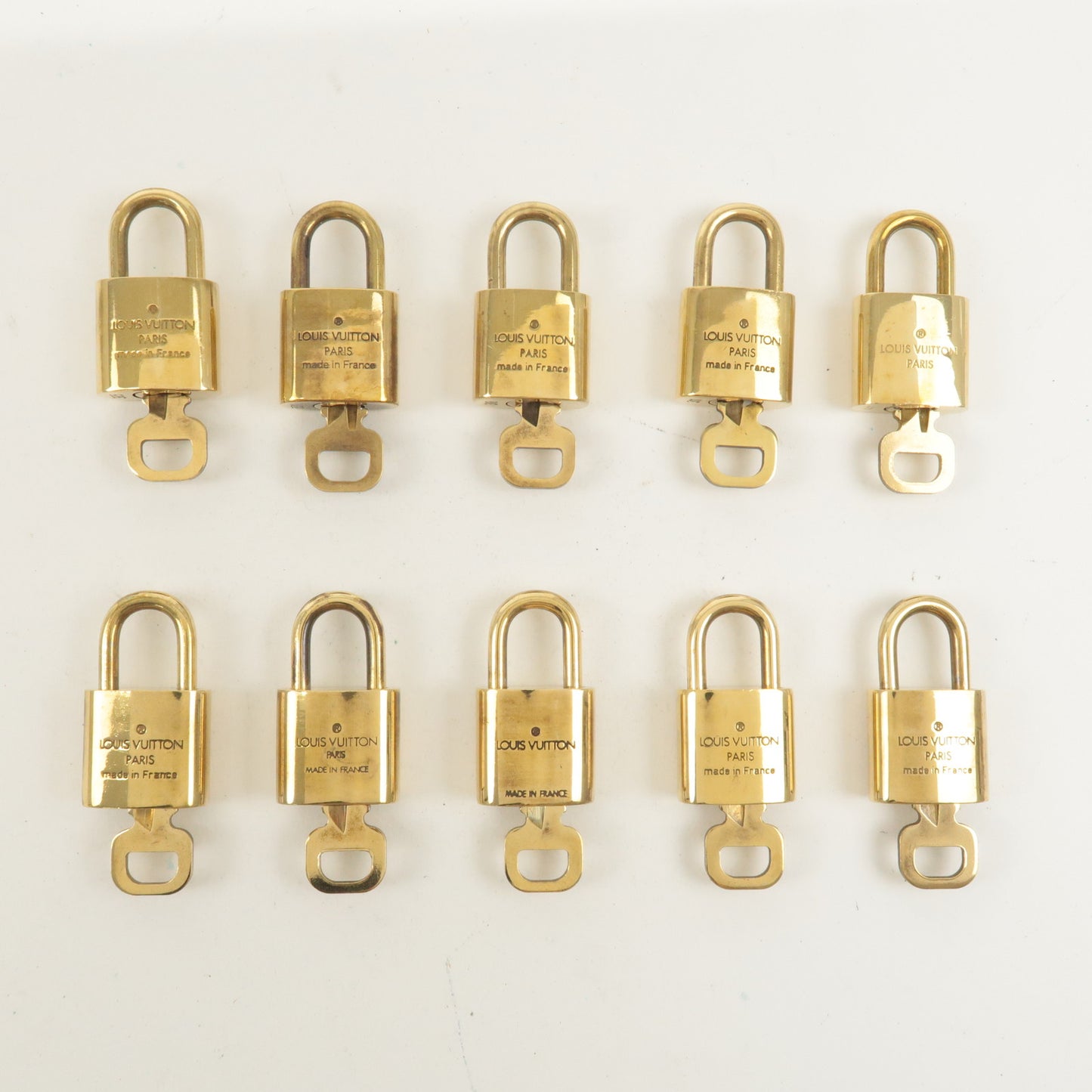 Louis Vuitton Set of 10 Lock & Key Cadena Key Lock Gold