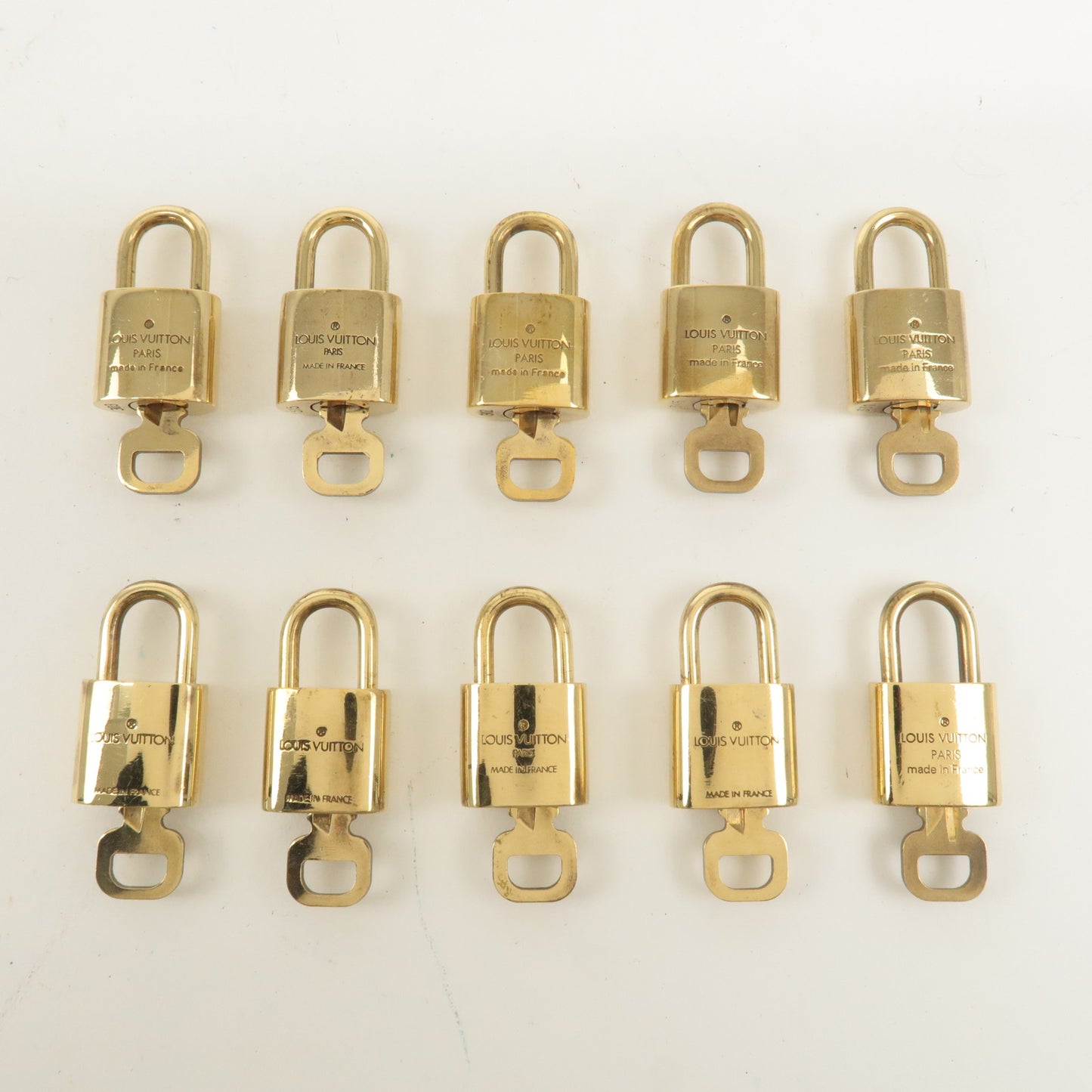 Louis Vuitton Set of 10 Lock & Key Cadena Key Lock Gold