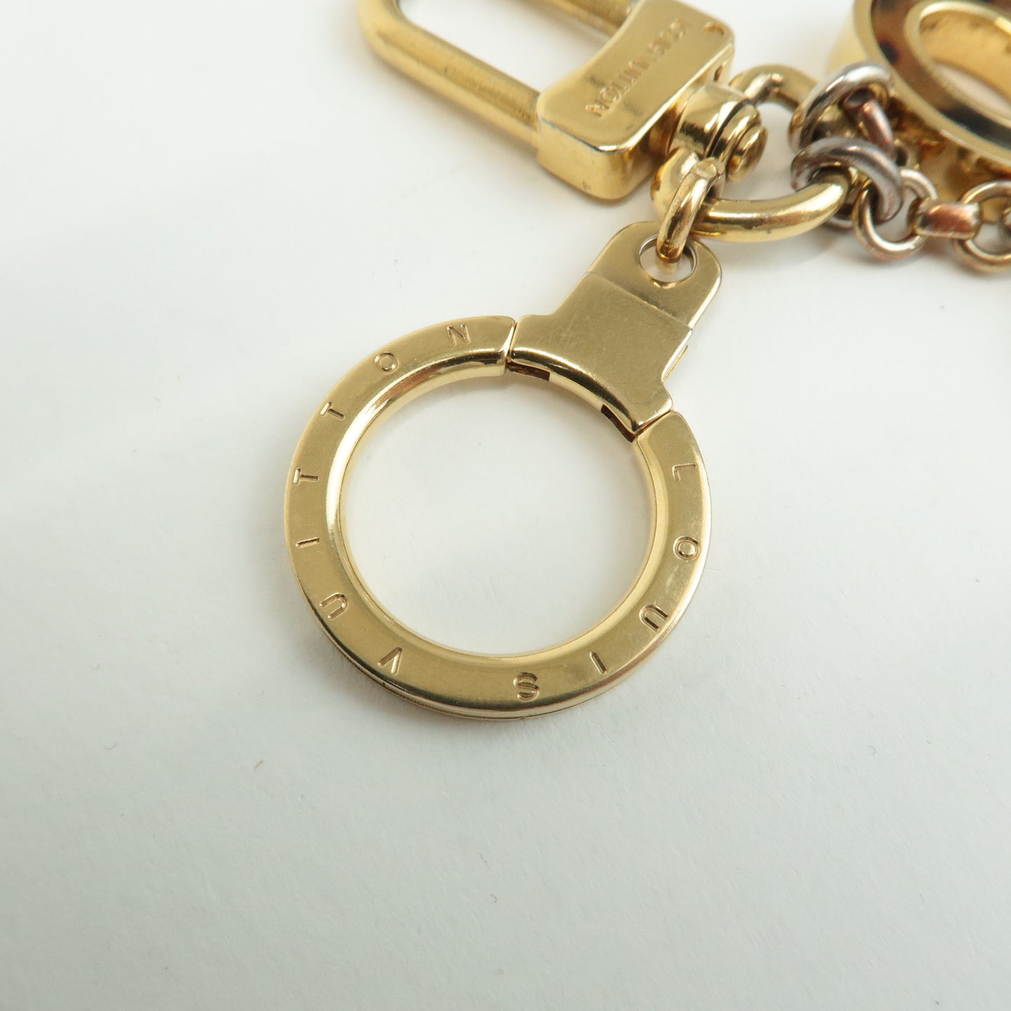 Louis Vuitton Porte Cles Confidence Bag Charm Gold M65088