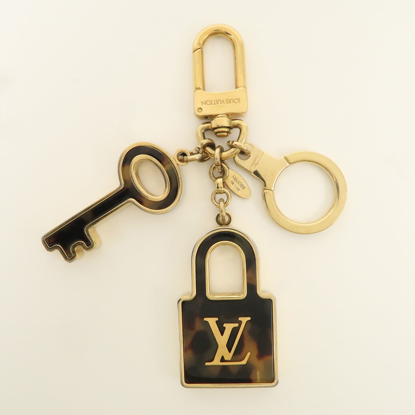 Louis Vuitton Porte Cles Confidence Bag Charm Gold M65088