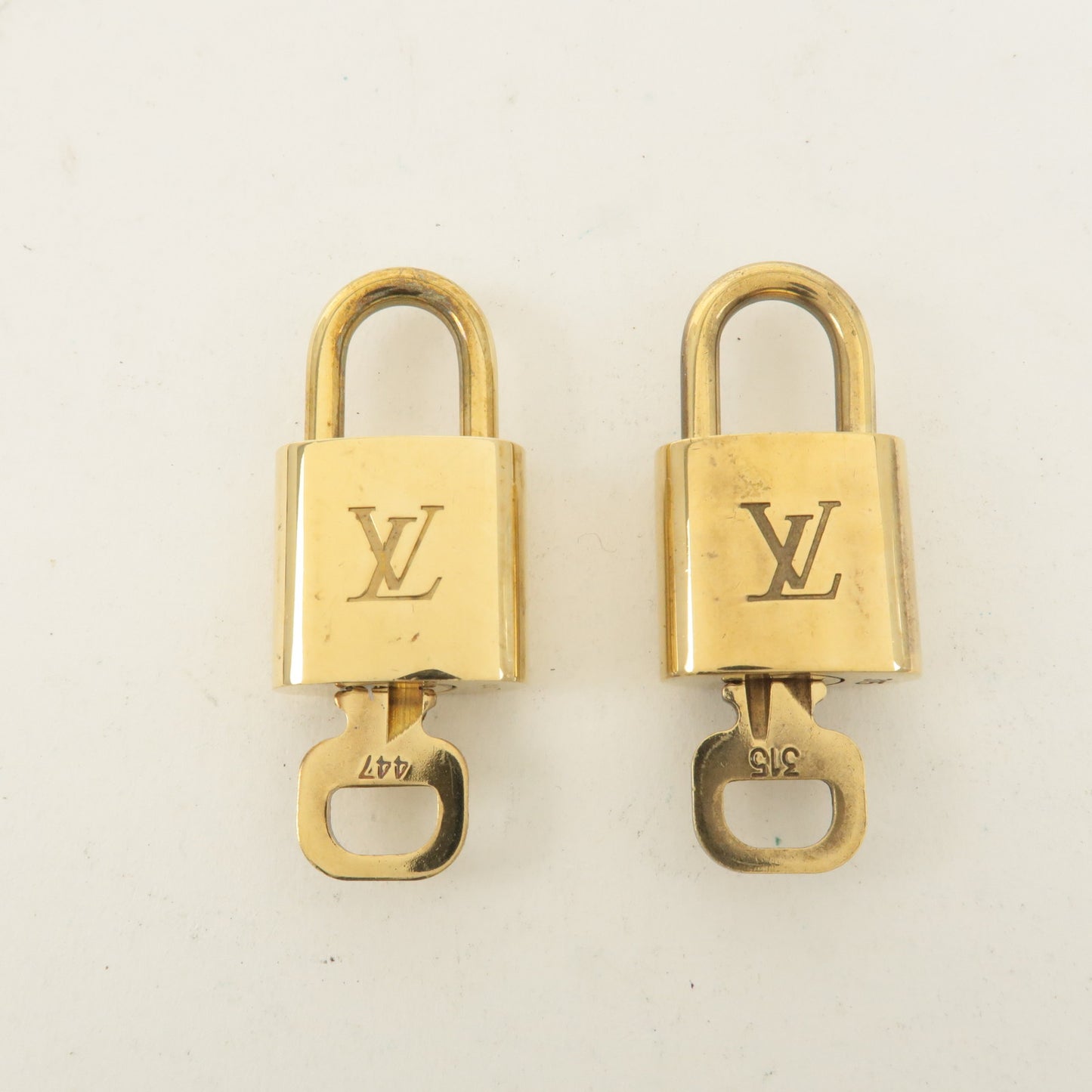 Louis Vuitton Set of 10 Lock & Key Cadena Key Lock Gold