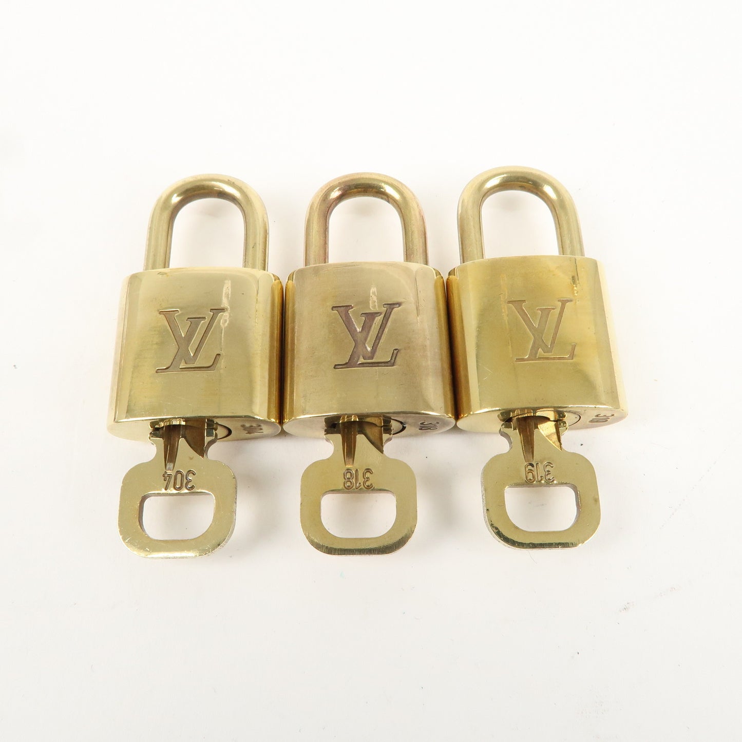 Louis Vuitton Set of 10 Lock & Key Cadena Key Lock Gold