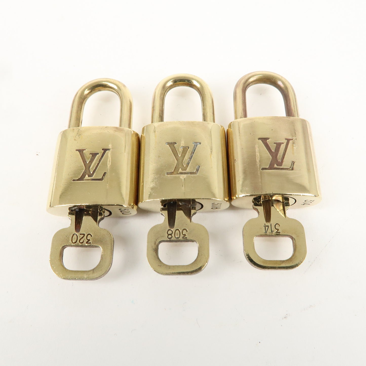 Louis Vuitton Set of 10 Lock & Key Cadena Key Lock Gold