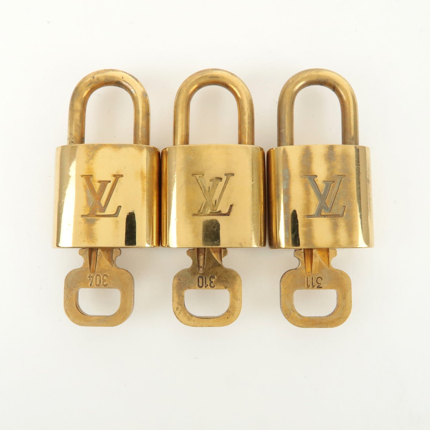 Louis Vuitton Set of 10 Lock & Key Cadena Key Lock Gold