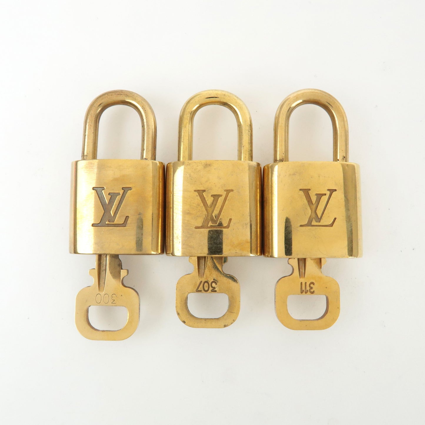 Louis Vuitton Set of 10 Lock & Key Cadena Key Lock Gold