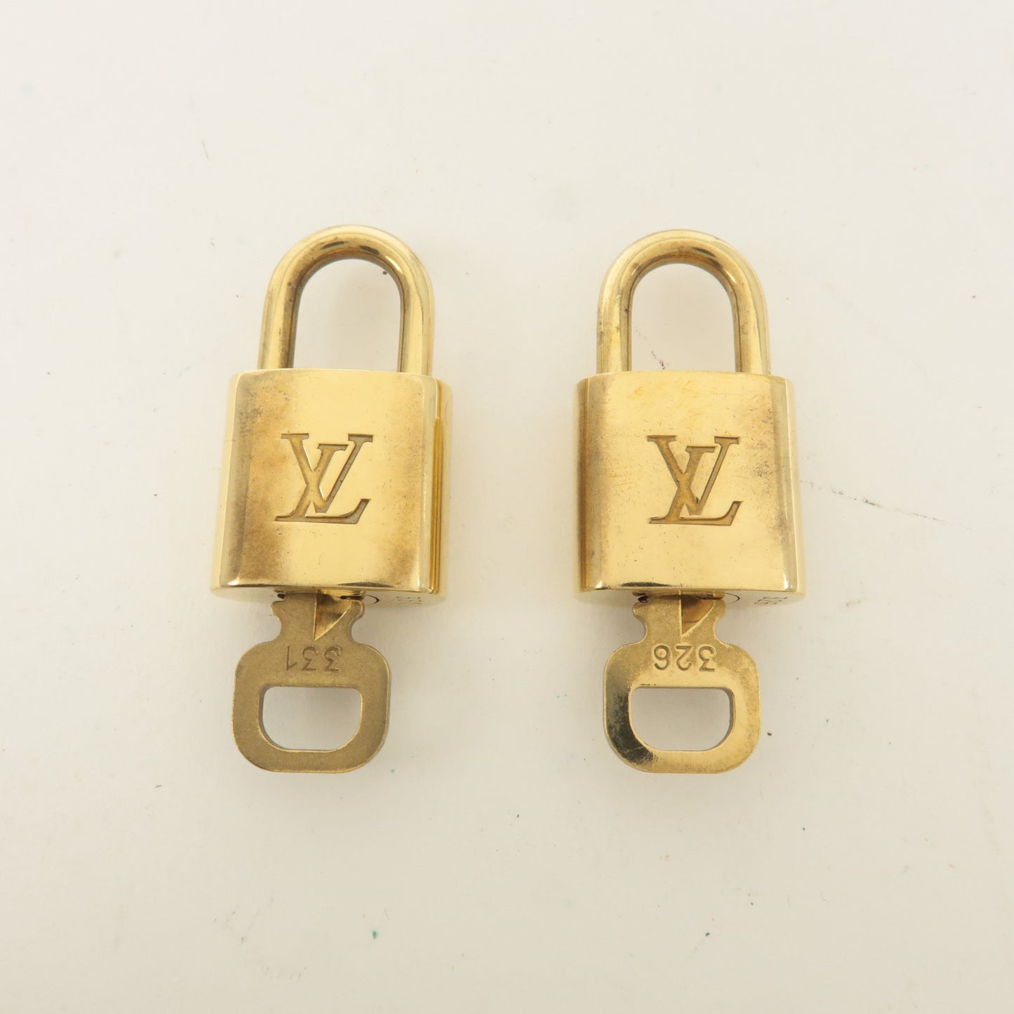 Louis Vuitton Set of 10 Lock & Key Cadena Key Lock Gold