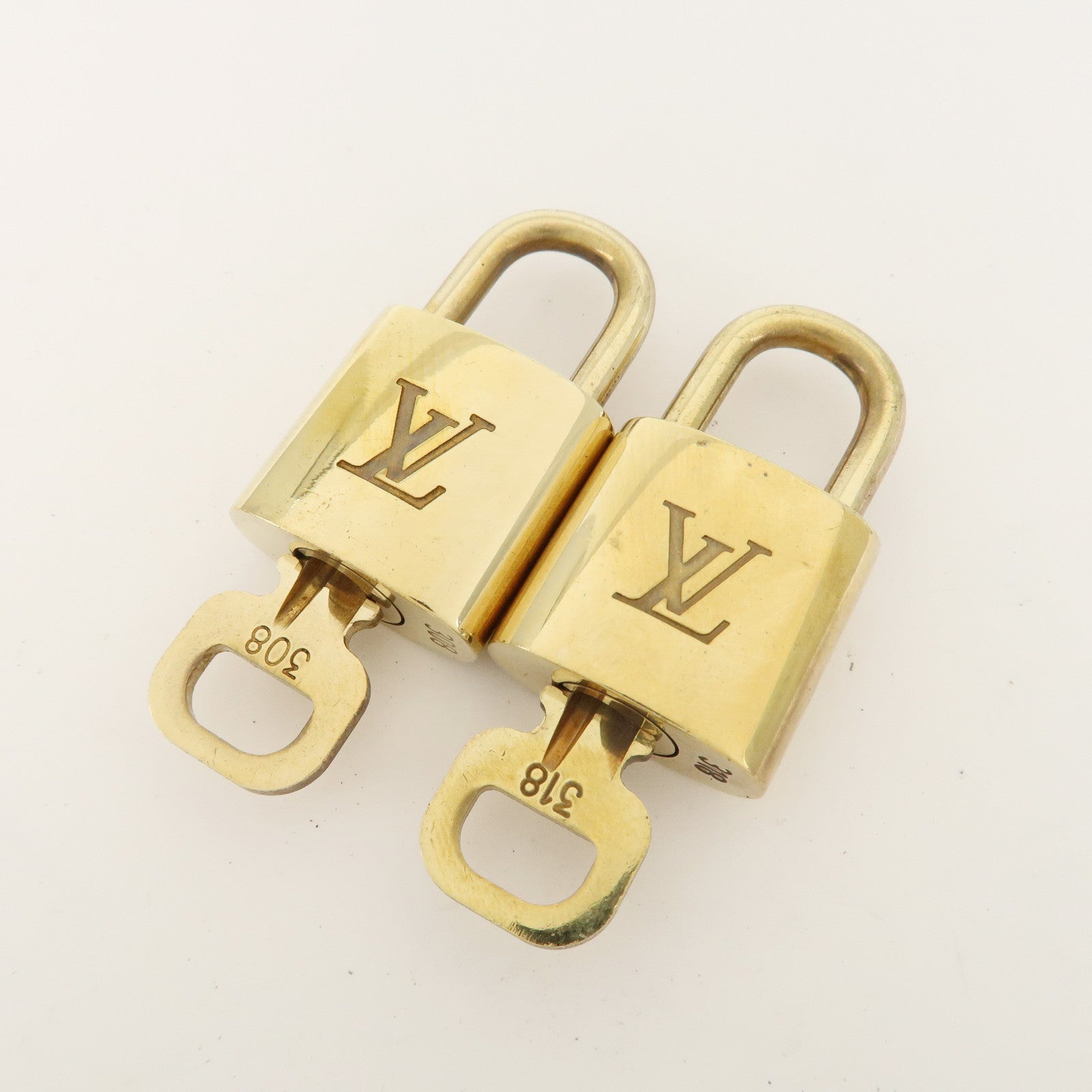 Louis Vuitton Set of 10 Lock & Key Cadena Key Lock Metal Gold