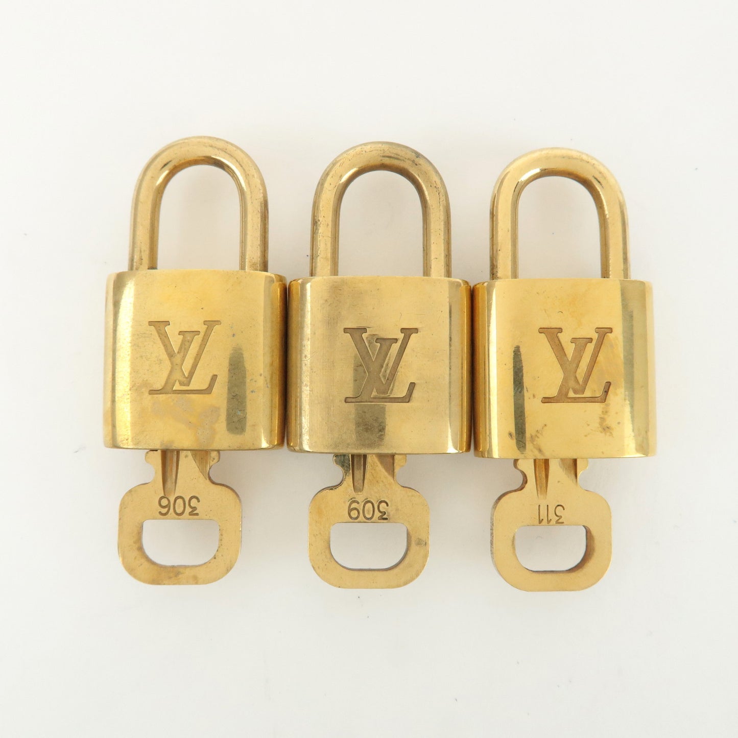 Louis Vuitton Set of 10 Lock & Key Cadena Key Lock Gold