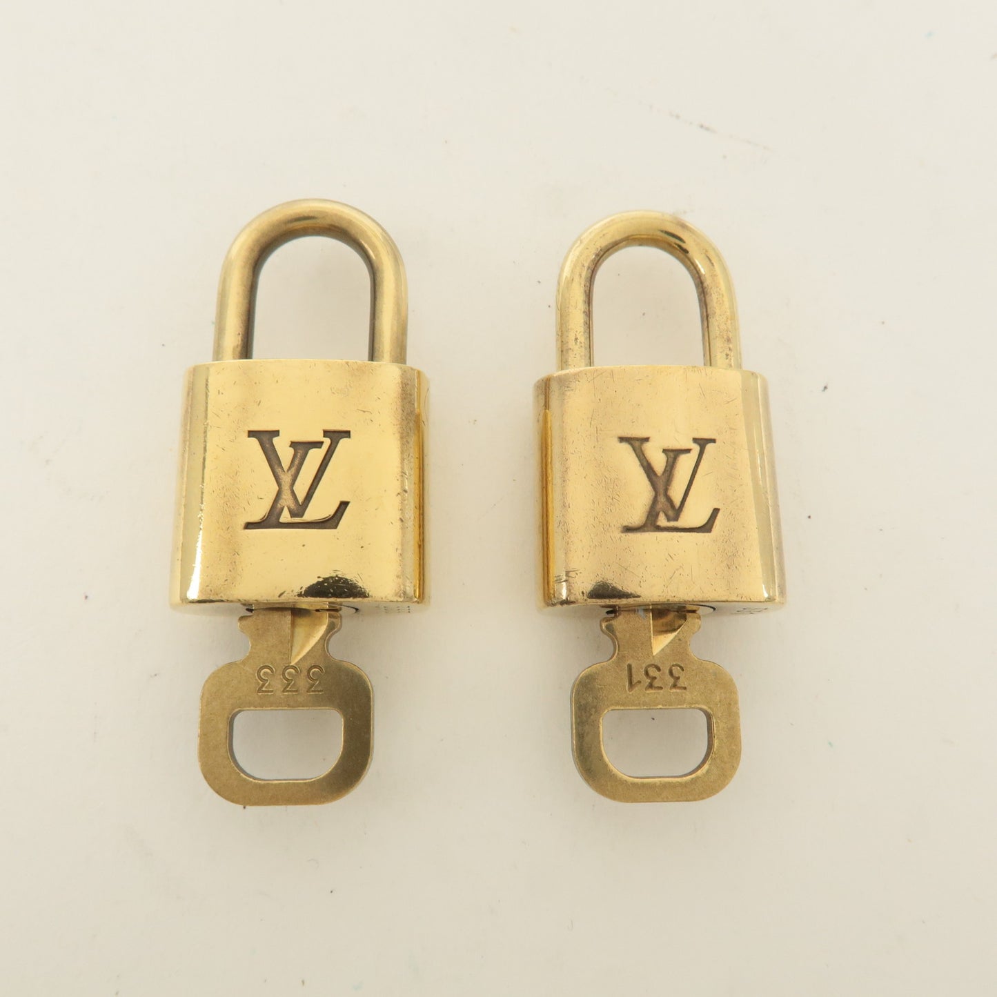 Louis Vuitton Set of 10 Lock & Key Cadena Key Lock Gold