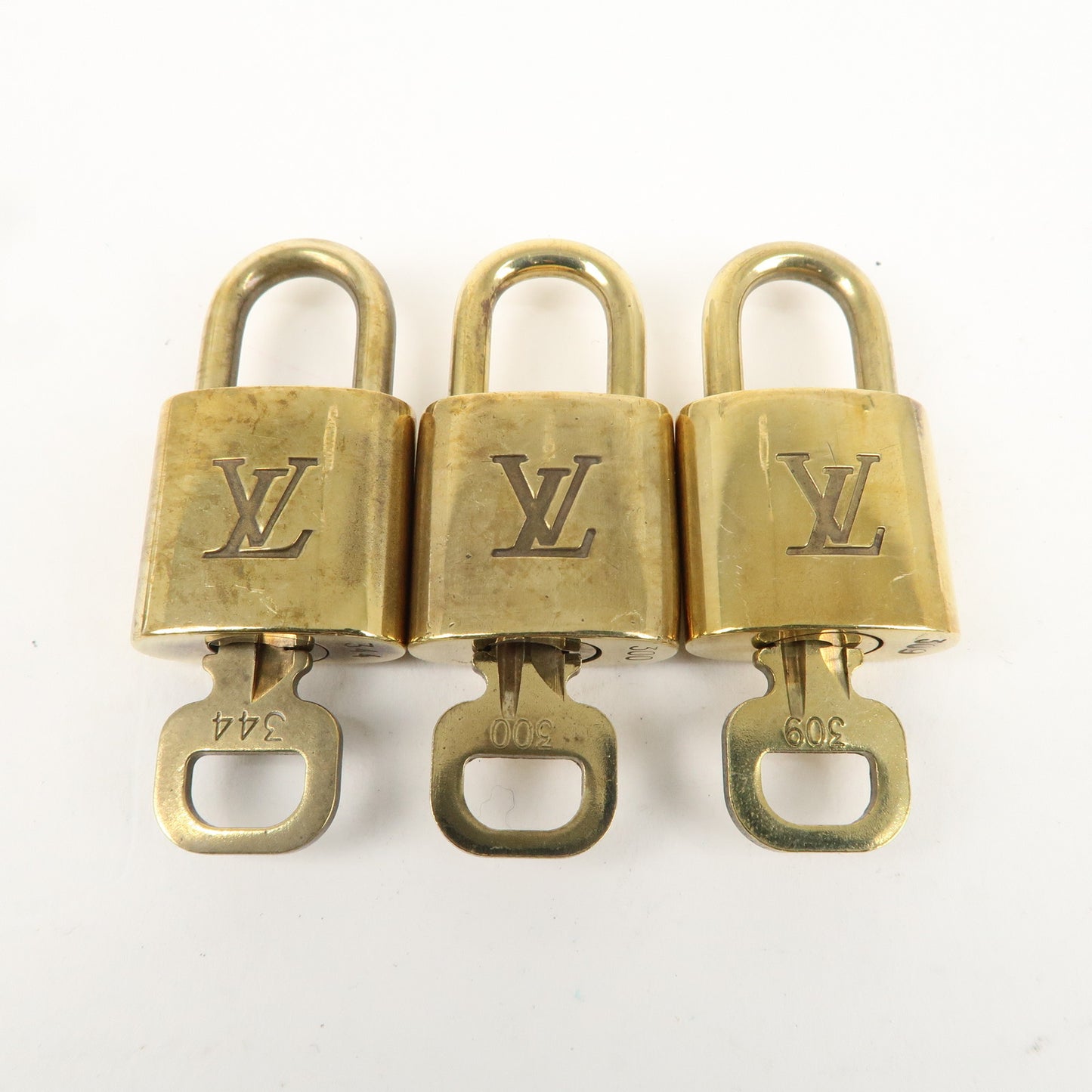 Louis Vuitton Set of 10 Lock & Key Cadena Key Lock Gold