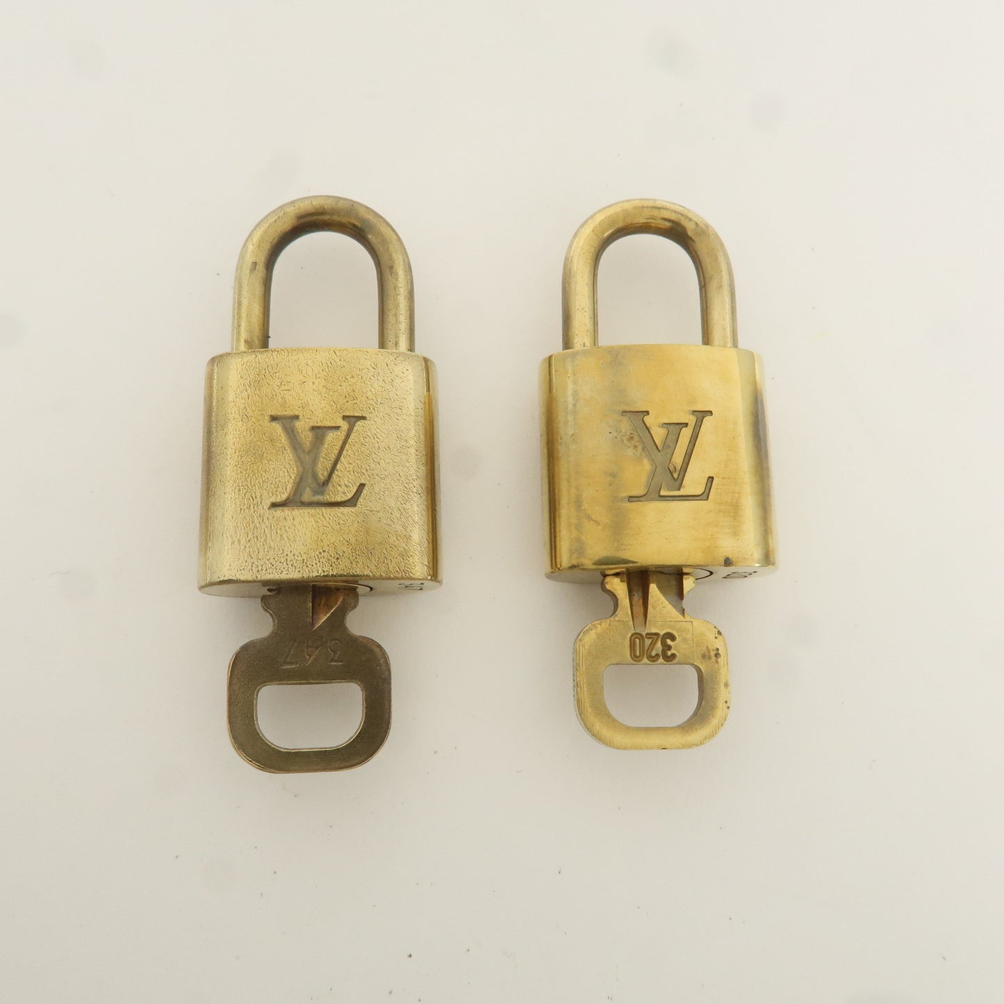 Louis Vuitton Set of 10 Lock & Key Cadena Key Lock Gold