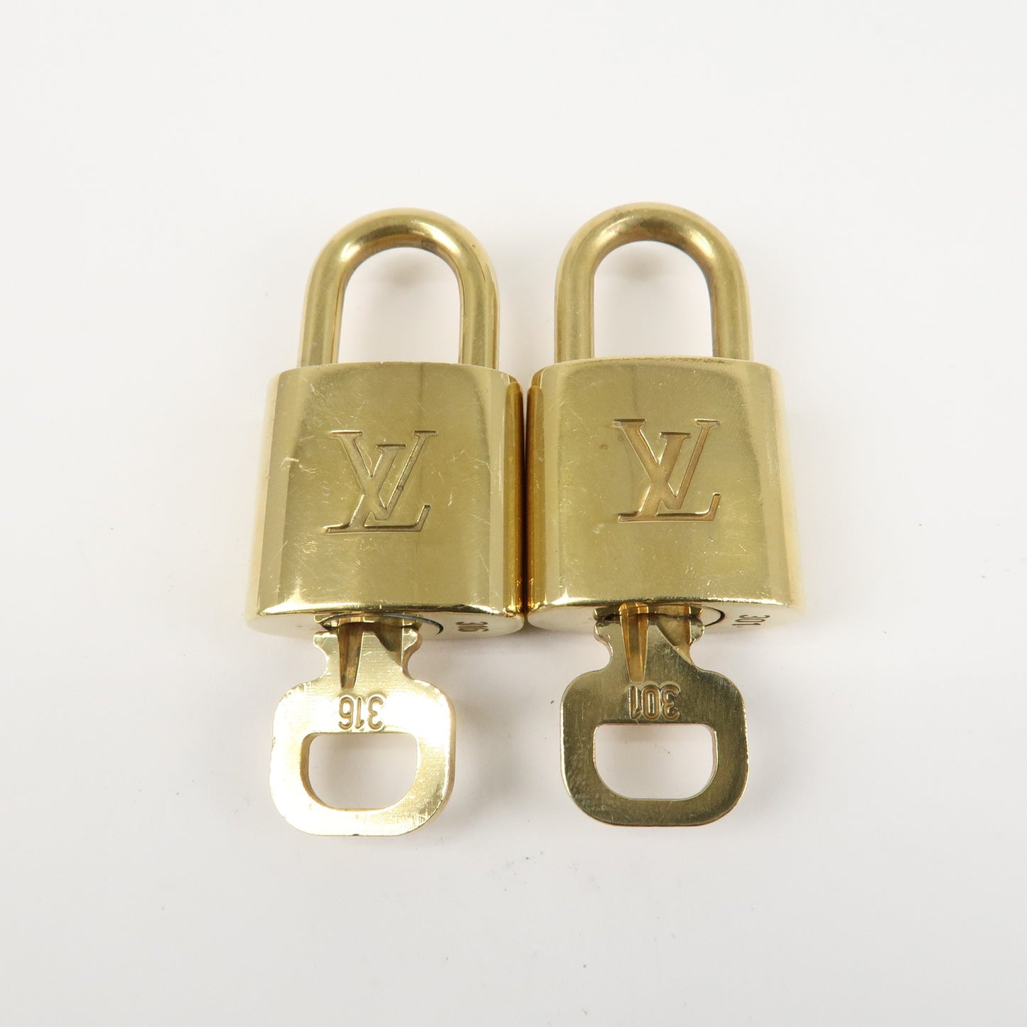 Louis Vuitton Set of 10 Lock & Key Cadena Key Lock Metal Gold