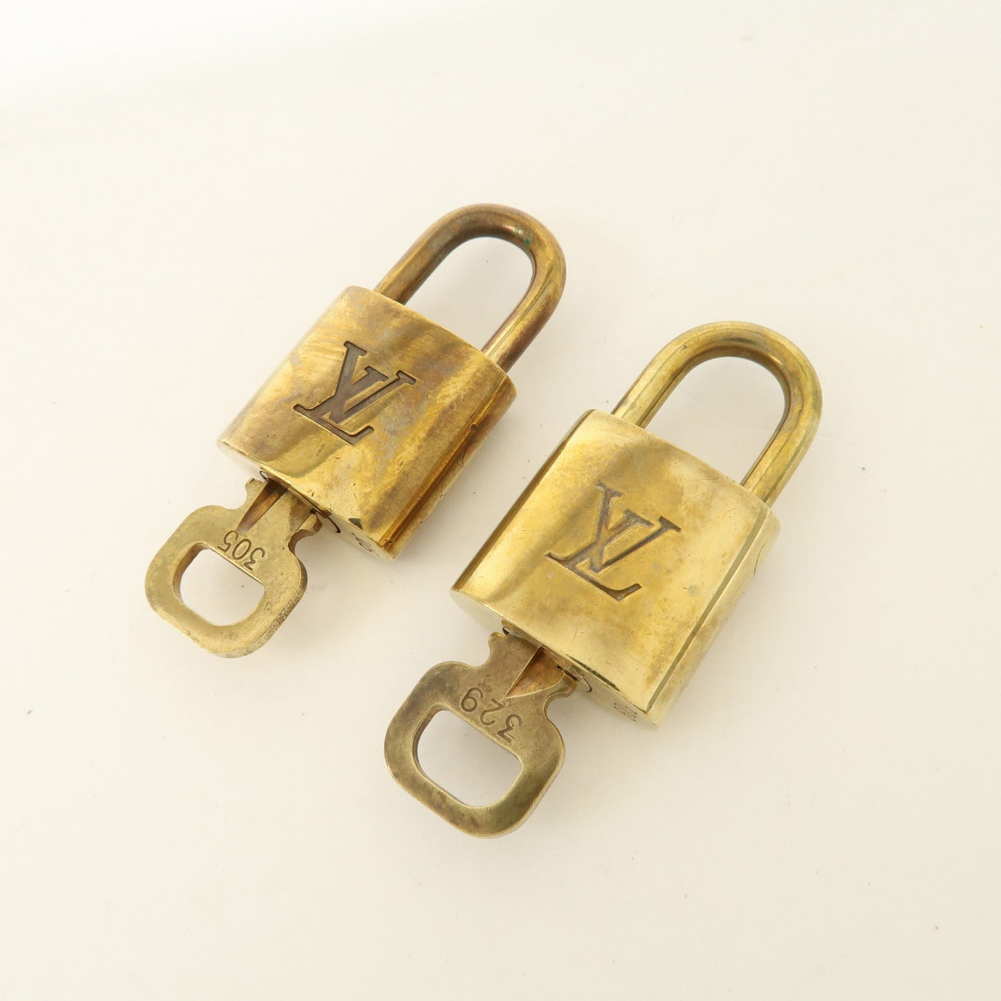 Louis Vuitton Set of 10 Lock & Key Cadena Key Lock Gold