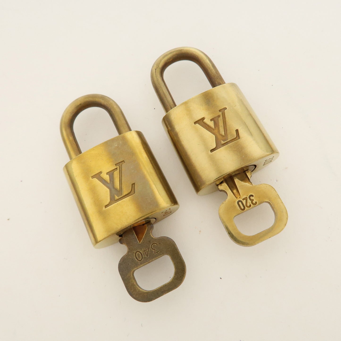 Louis Vuitton Set of 10 Lock & Key Cadena Key Lock Gold