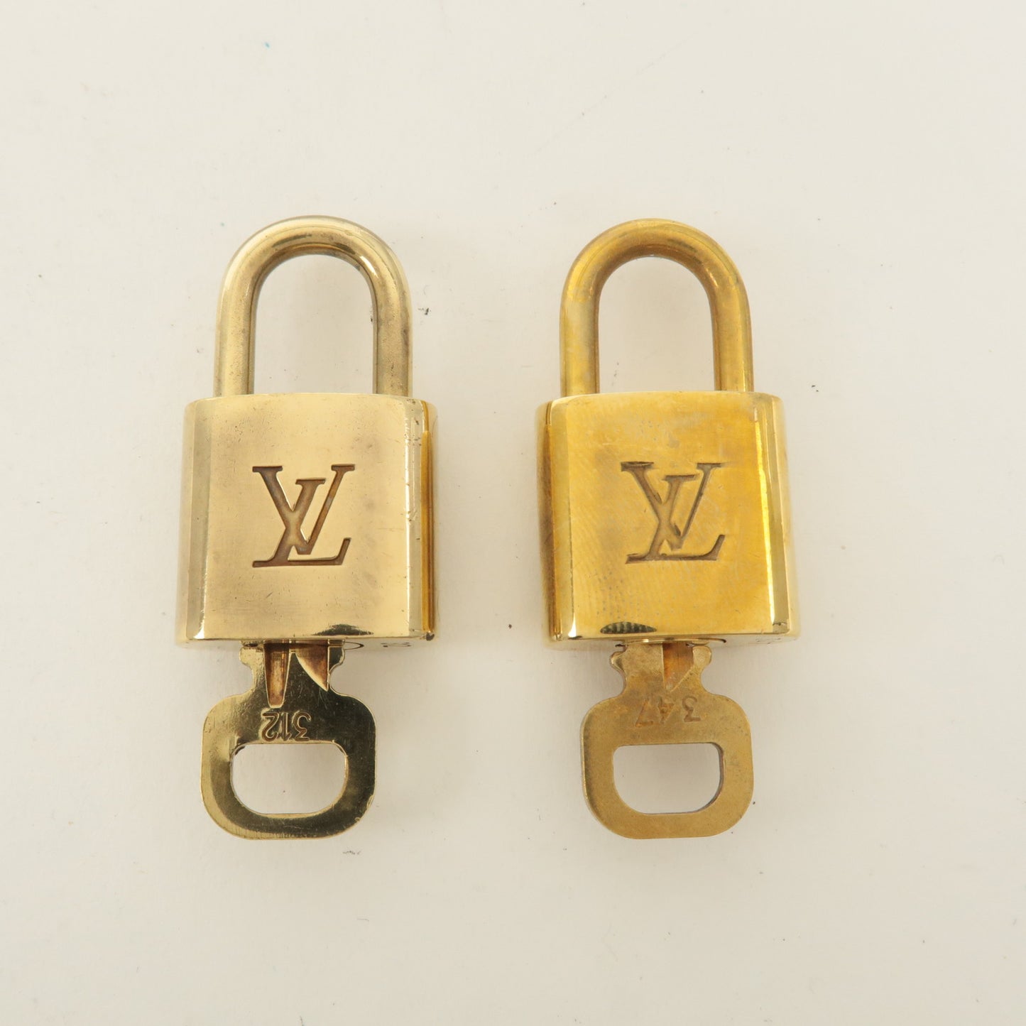 Louis Vuitton Set of 10 Lock & Key Cadena Key Lock Gold