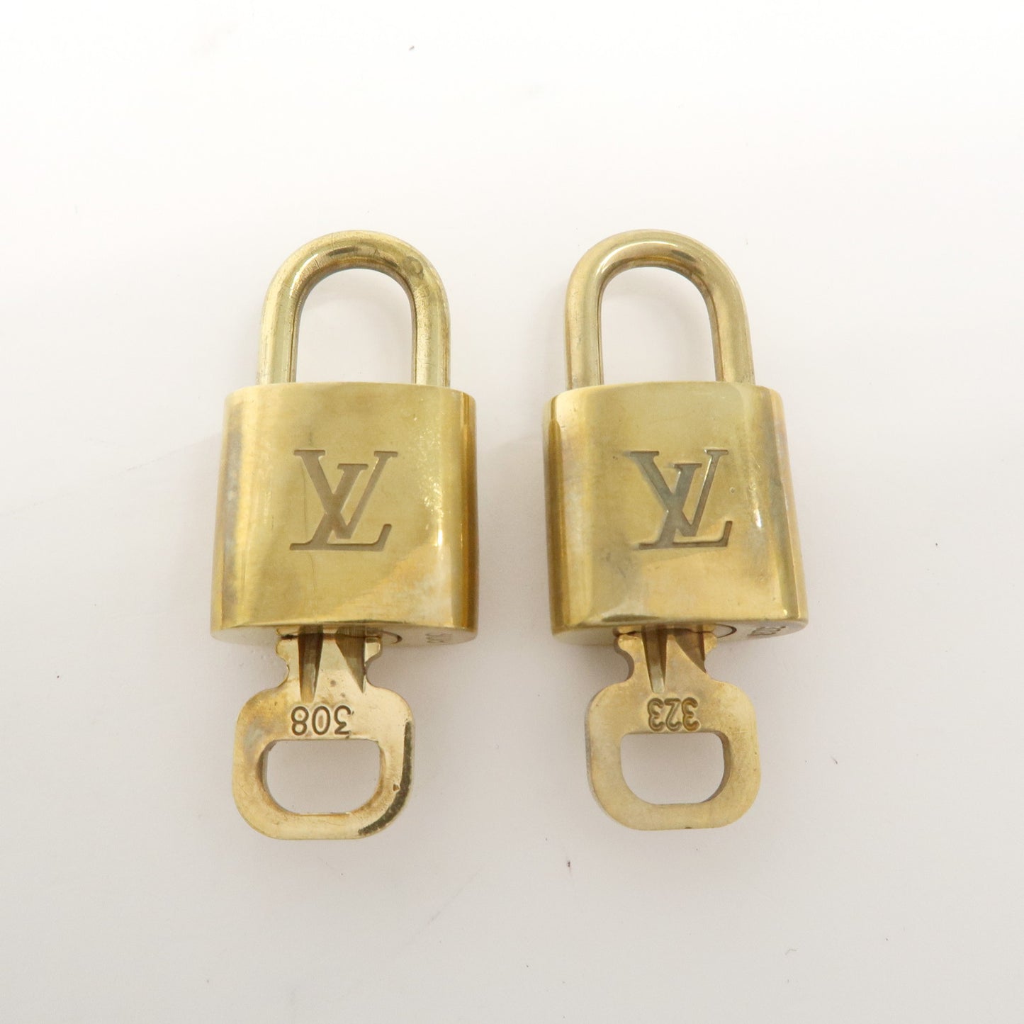 Louis Vuitton Set of 10 Lock & Key Cadena Key Lock Gold