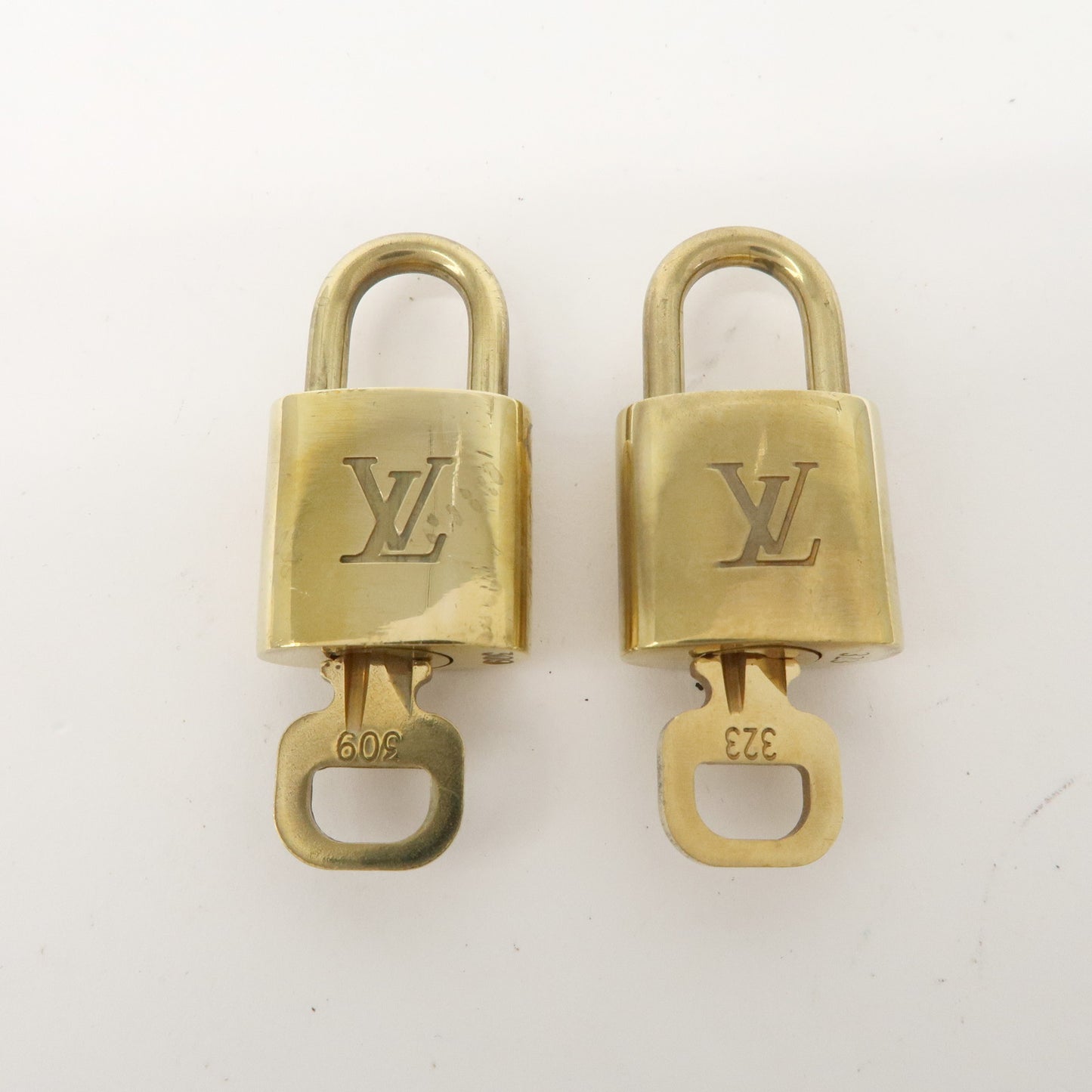 Louis Vuitton Set of 10 Lock & Key Cadena Key Lock Gold