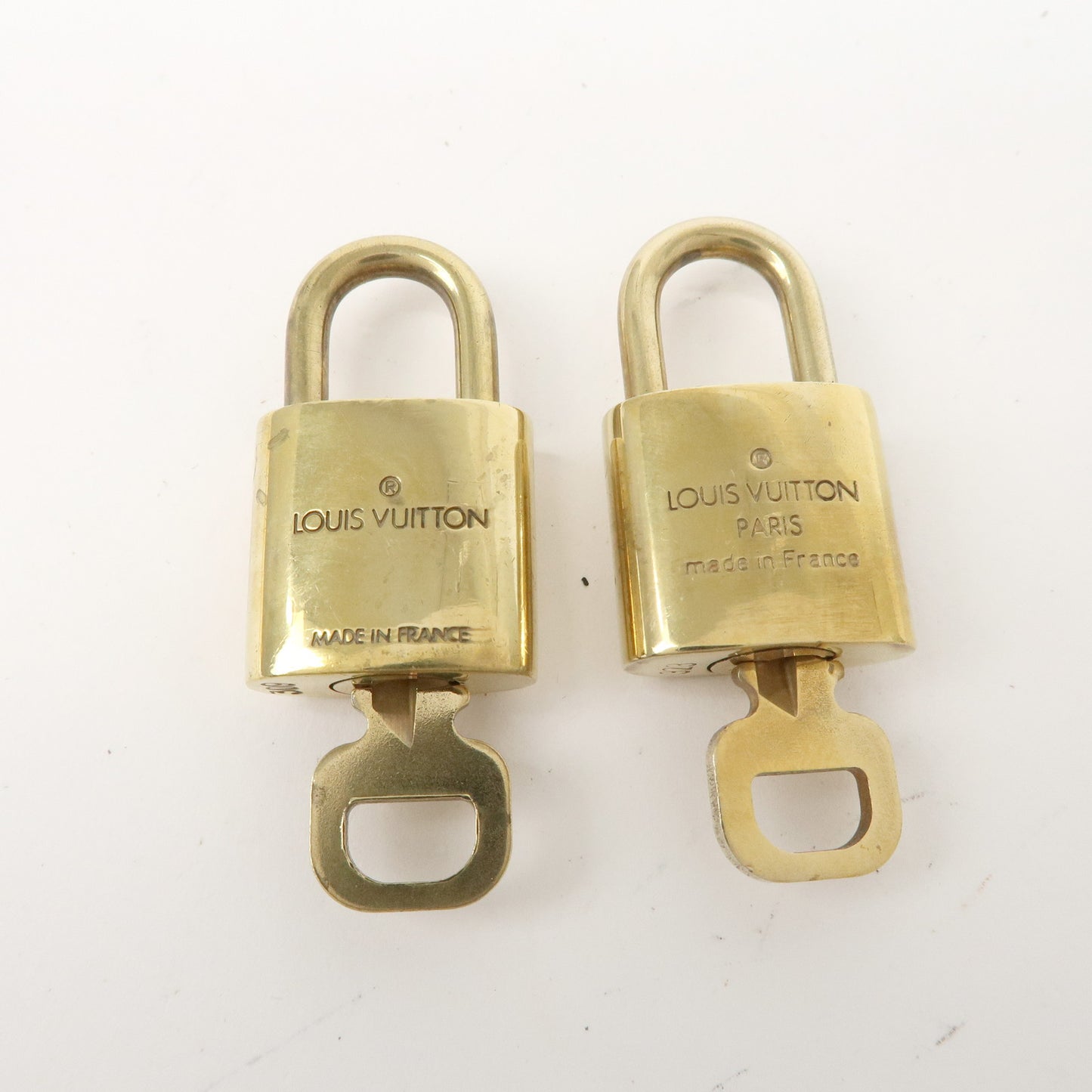 Louis Vuitton Set of 10 Lock & Key Cadena Key Lock Gold