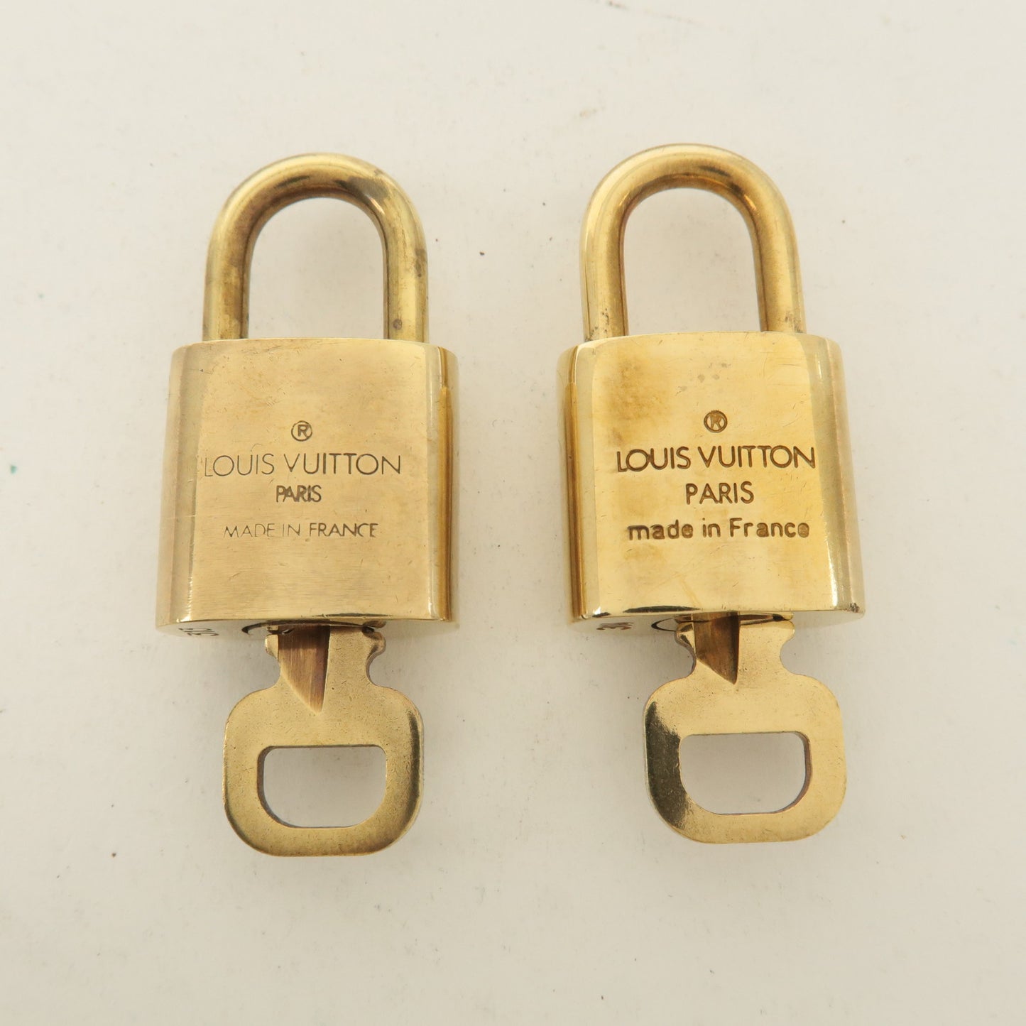 Louis Vuitton Set of 10 Lock & Key Cadena Key Lock Gold