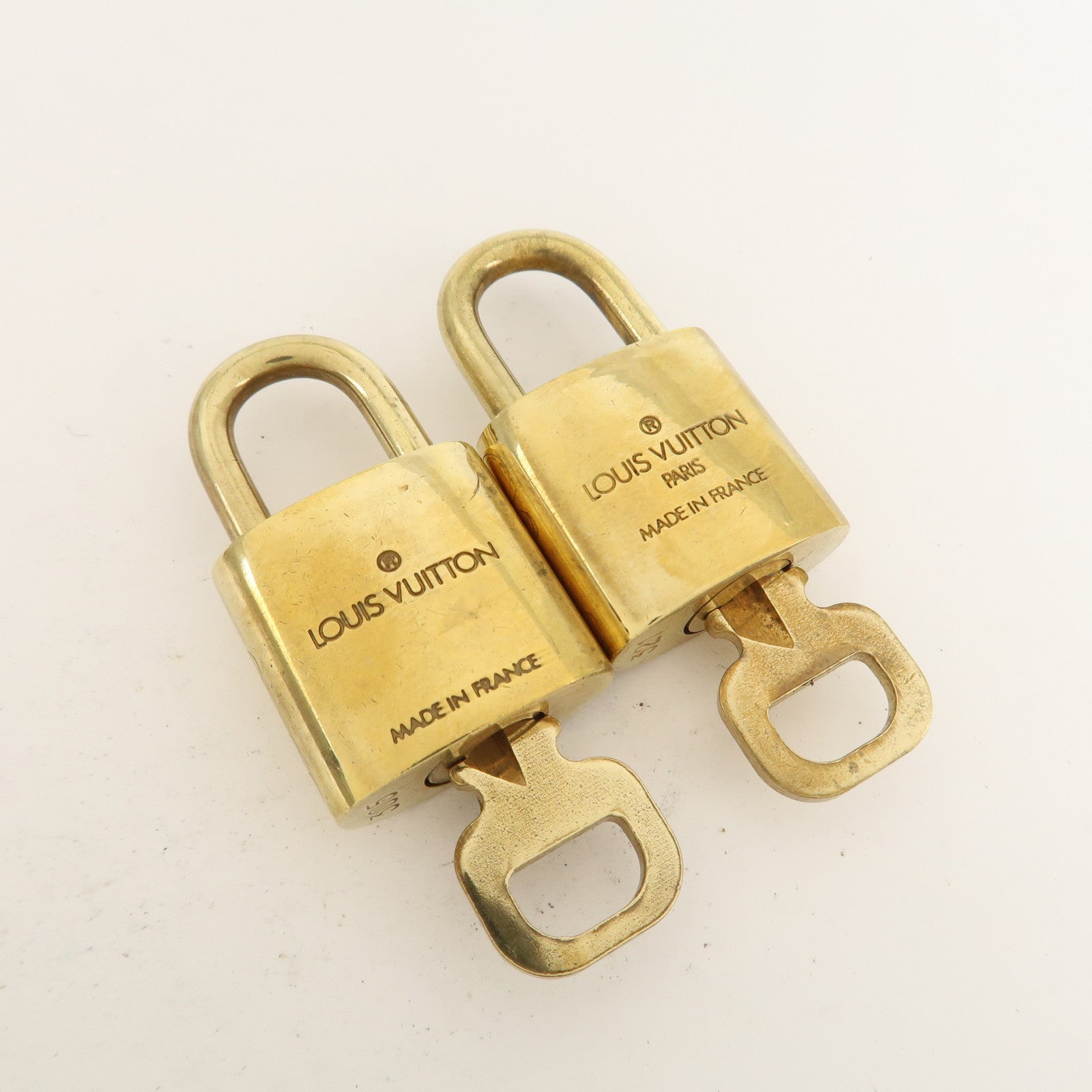 Louis Vuitton Set of 10 Lock & Key Cadena Key Lock Metal Gold