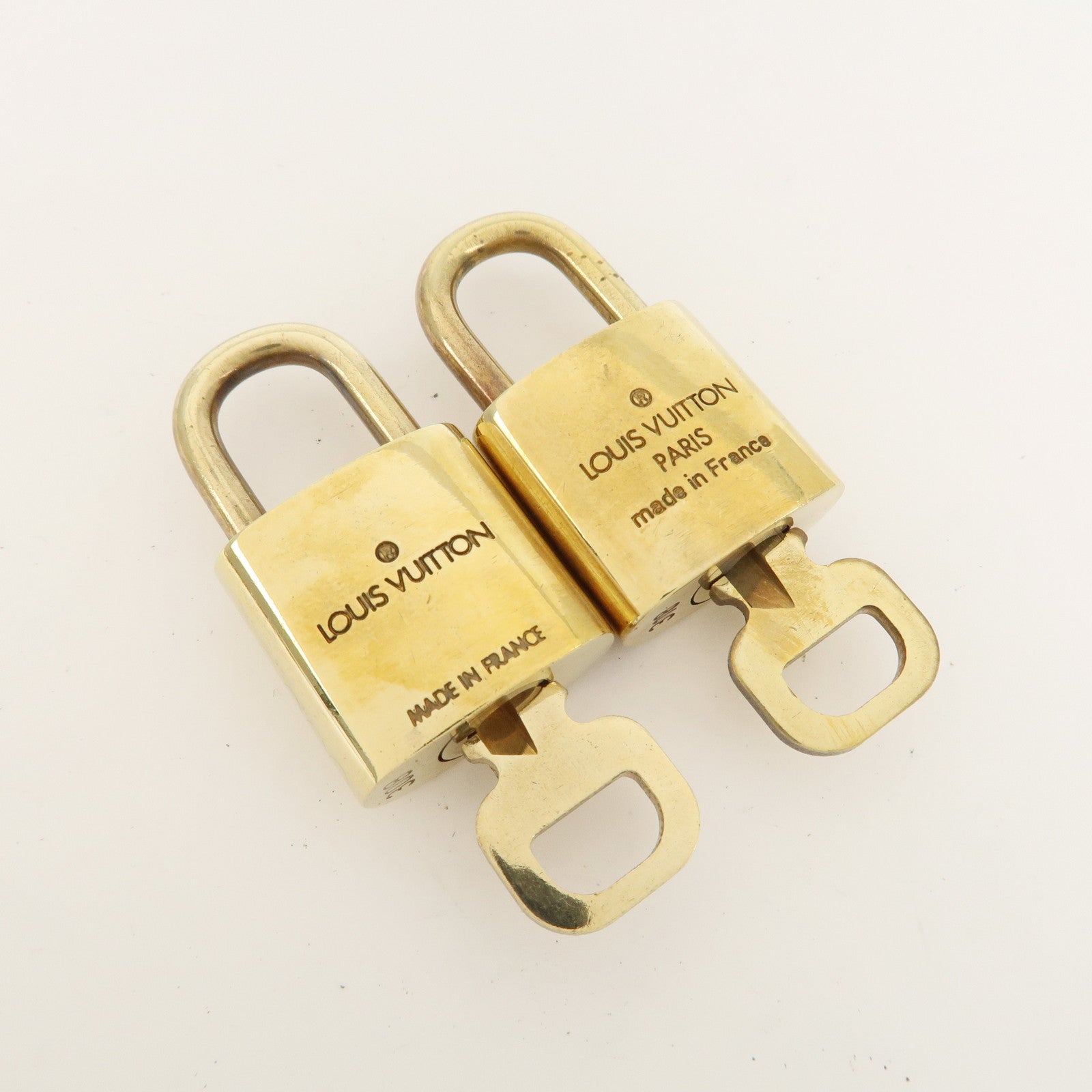 Louis Vuitton Set of 10 Lock & Key Cadena Key Lock Metal Gold