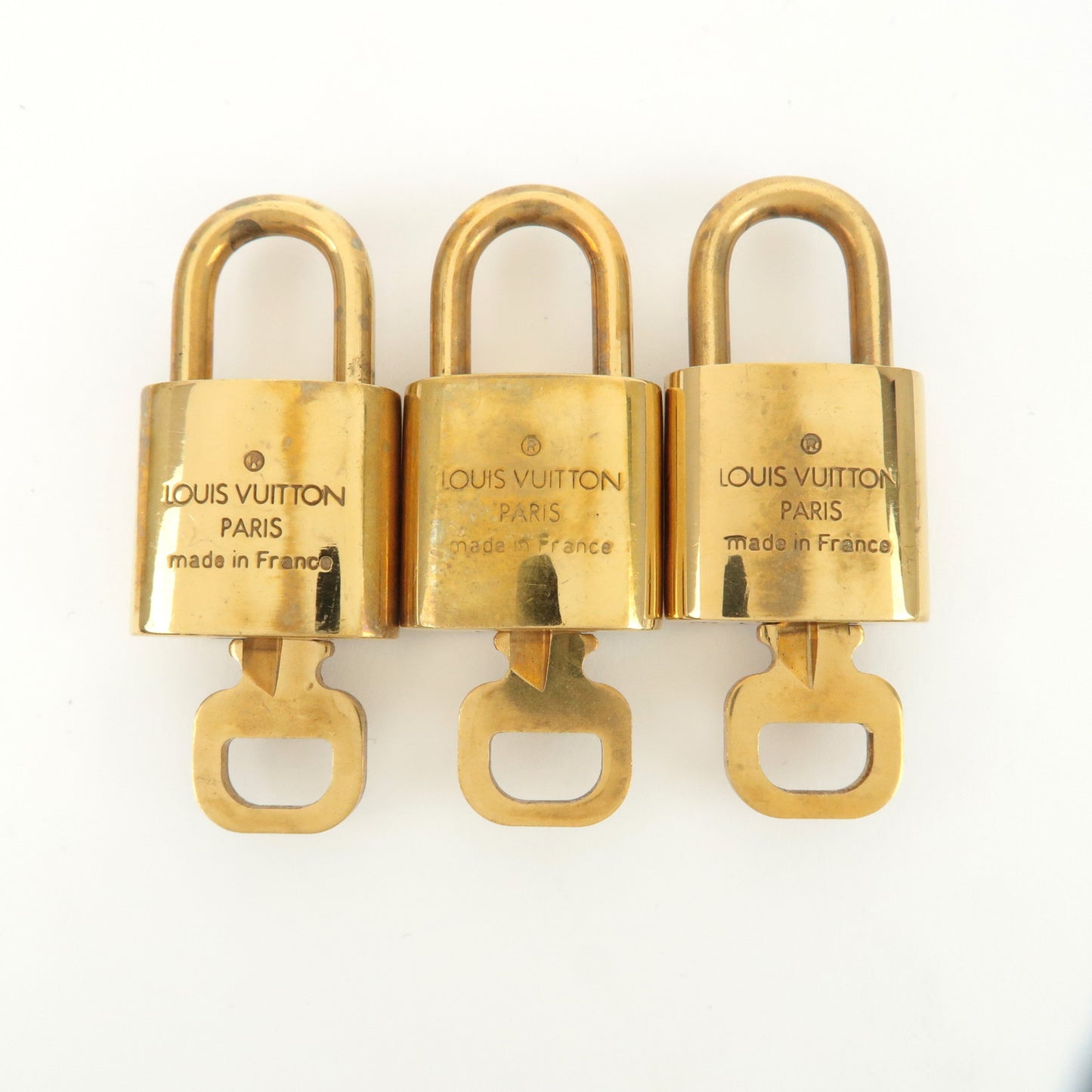 Louis Vuitton Set of 10 Lock & Key Cadena Key Lock Gold