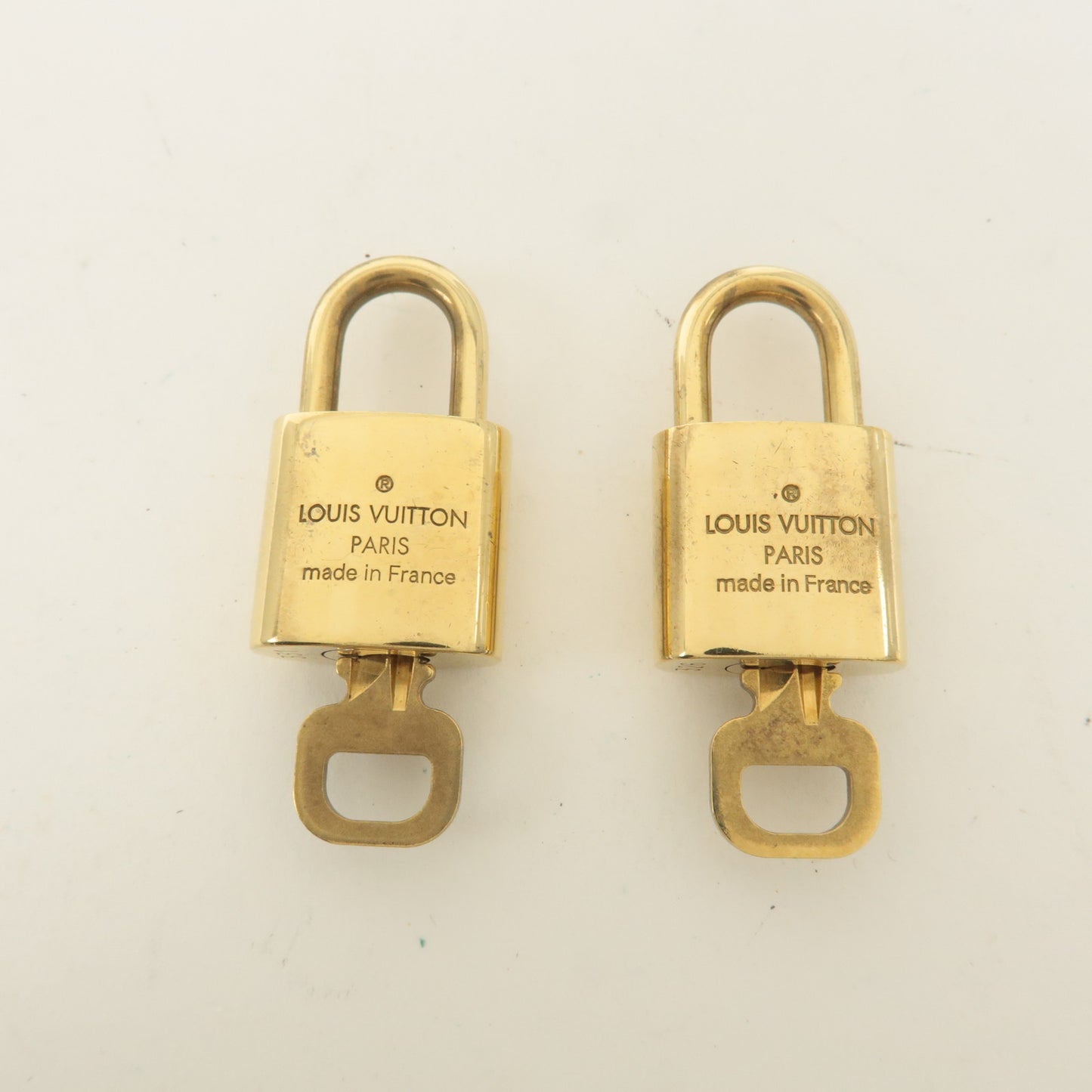 Louis Vuitton Set of 10 Lock & Key Cadena Key Lock Gold