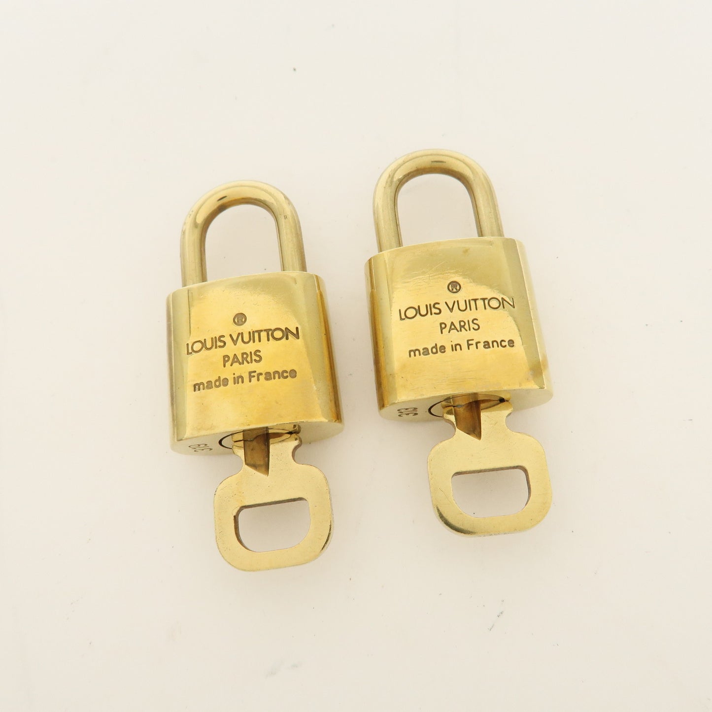 Louis Vuitton Set of 10 Lock & Key Cadena Key Lock Gold